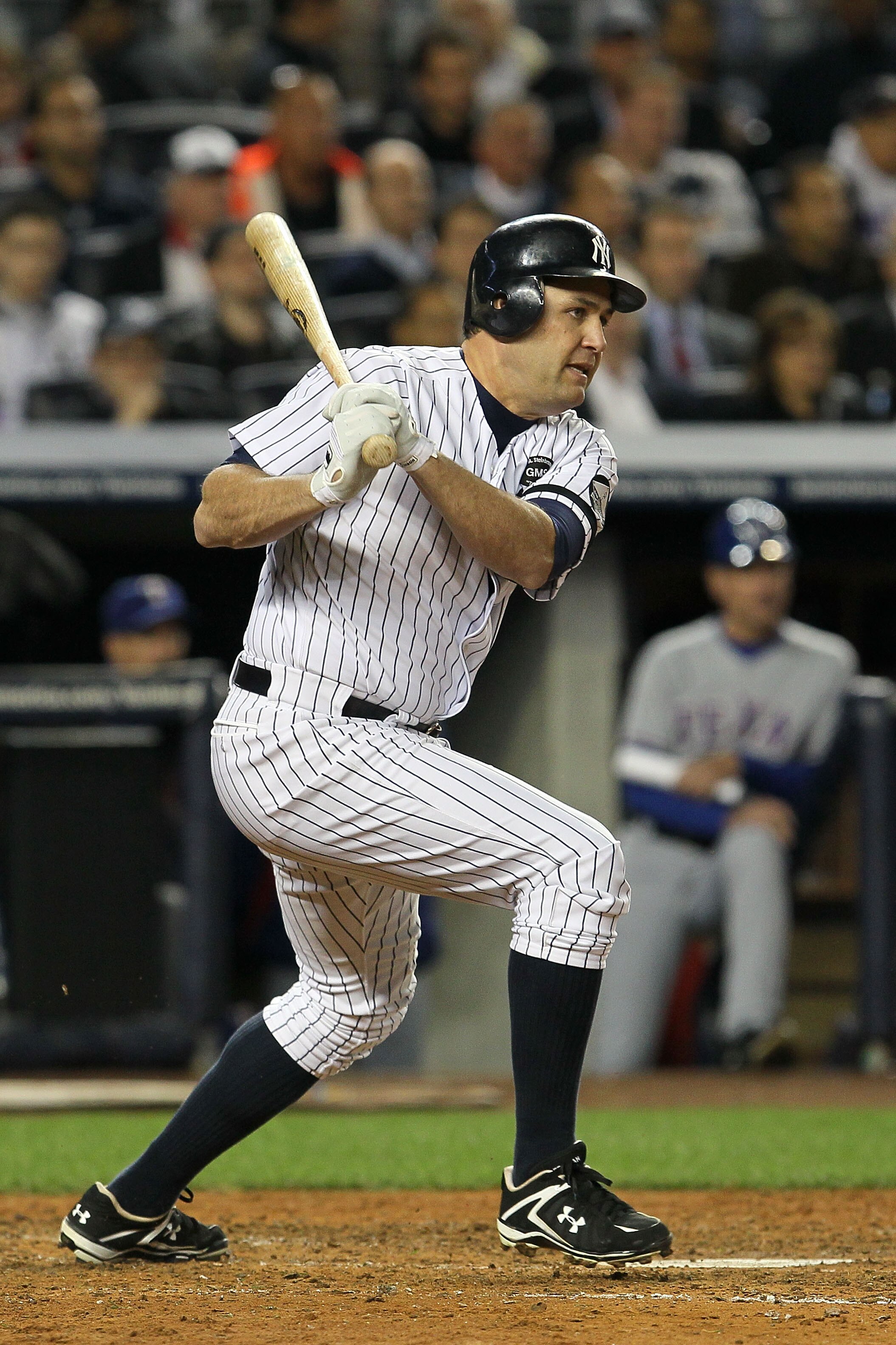 NEW YORK - OCTOBER 19:  Lance Berkman #17 of the New York Yankees hits a base hit in the fourth inning against the Texas Rangers in Game Four of the ALCS during the 2010 MLB Playoffs at Yankee Stadium on October 19, 2010 in the Bronx borough of New York C
