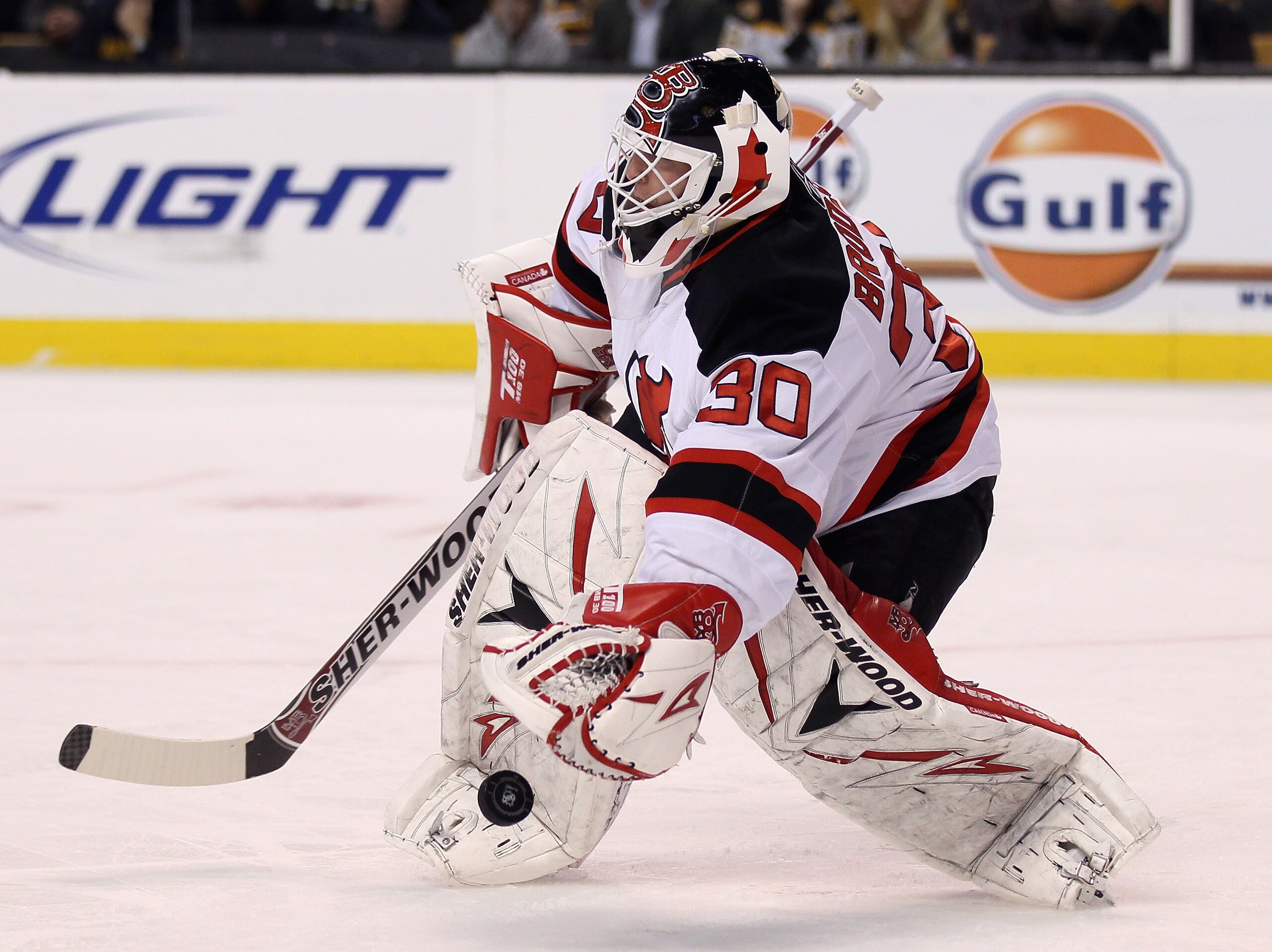 BOSTON - NOVEMBER 15:  Martin Brodeur #30 of the New Jersey Devils stops a shot in the first period against the Boston Bruins on November 15, 2010 at the TD Garden in Boston, Massachusetts.  (Photo by Elsa/Getty Images)