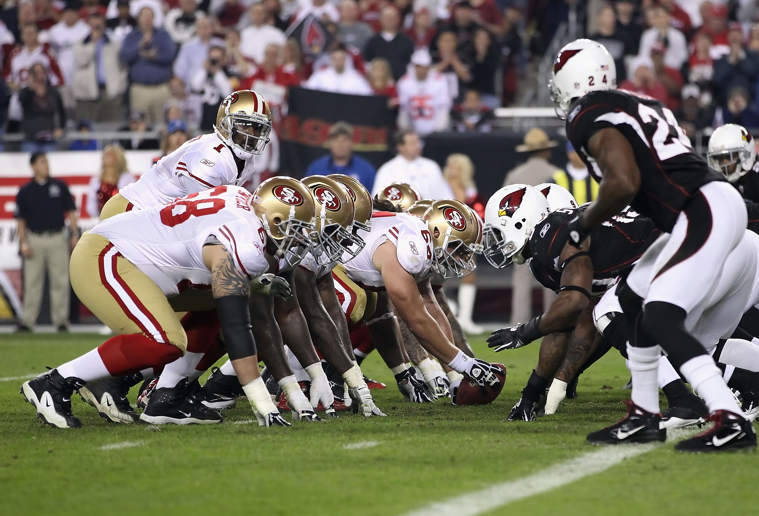 GLENDALE, AZ - NOVEMBER 29:  Quarterback Troy Smith #1 of the San Francisco 49ers prepares to snap the ball during the first quarter of the NFL game against the Arizona Cardinals at the University of Phoenix Stadium on November 29, 2010 in Glendale, Arizo