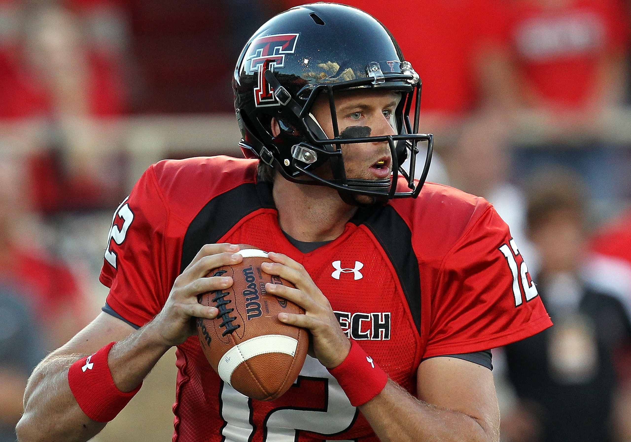 LUBBOCK, TX - SEPTEMBER 18:  Quarterback Taylor Potts #12 of the Texas Tech Red Raiders against the Texas Longhorns at Jones AT&T Stadium on September 18, 2010 in Lubbock, Texas.  (Photo by Ronald Martinez/Getty Images)