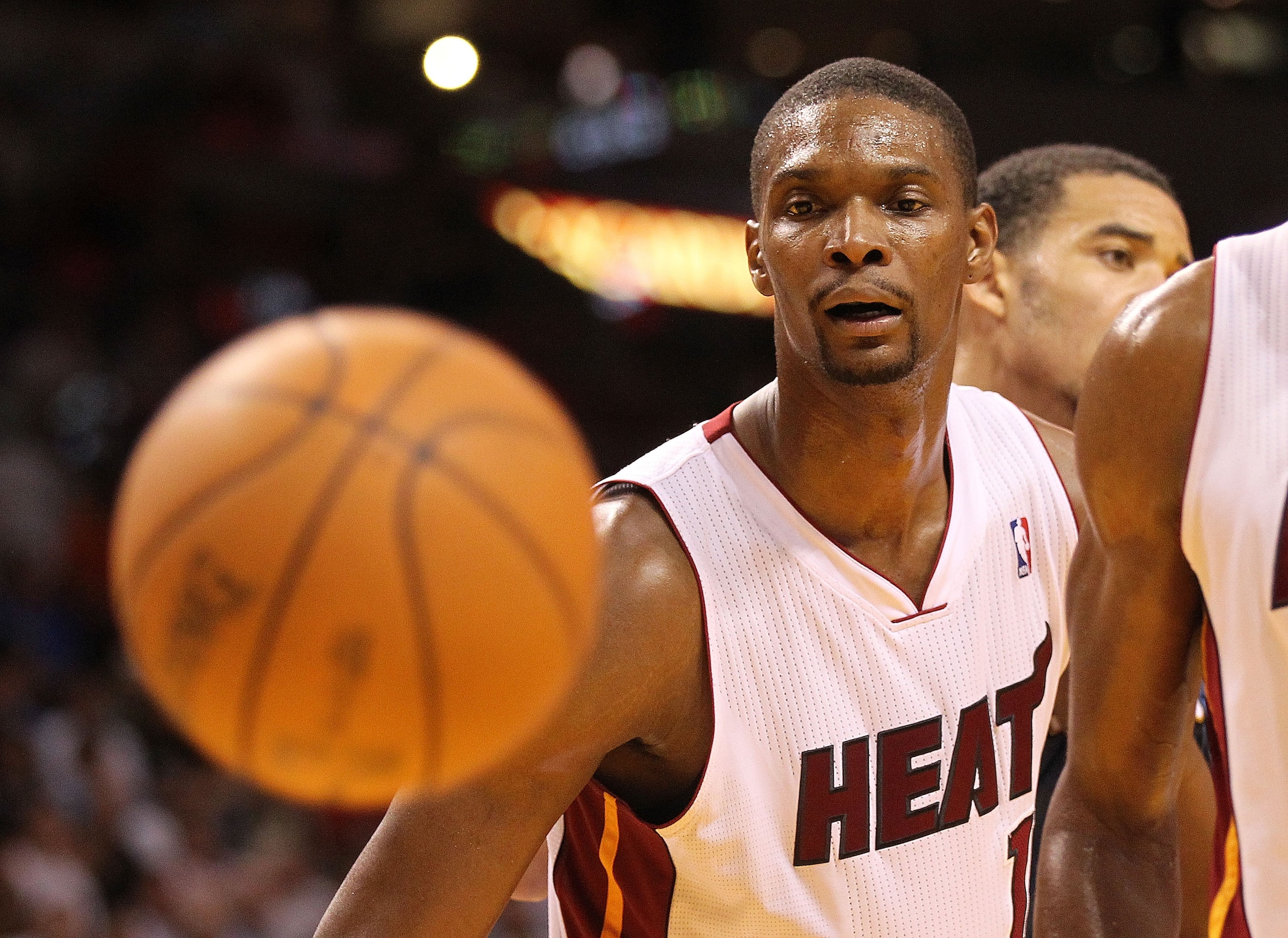 MIAMI, FL - NOVEMBER 29: Chris Bosh #1 of the Miami Heat watches the ball go out of bounds during a game against the Washington Wizards at American Airlines Arena on November 29, 2010 in Miami, Florida. NOTE TO USER: User expressly acknowledges and agrees