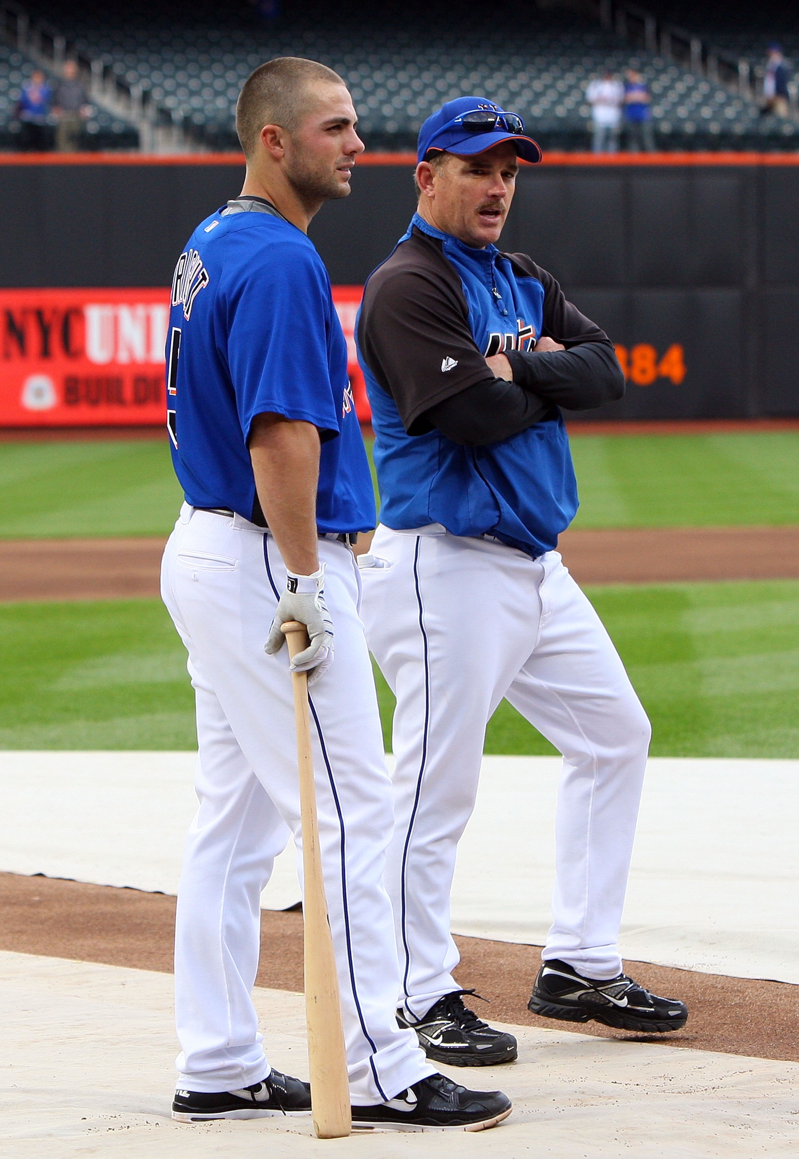 NEW YORK - MAY 12:  David Wright #5 (L) and hitting coach Howard Johnson of the New York Mets look on during batting practice prior to playing the Atlanta Braves at Citi Field May 12, 2009 in the Flushing neighborhood of the Queens borough of New York Cit