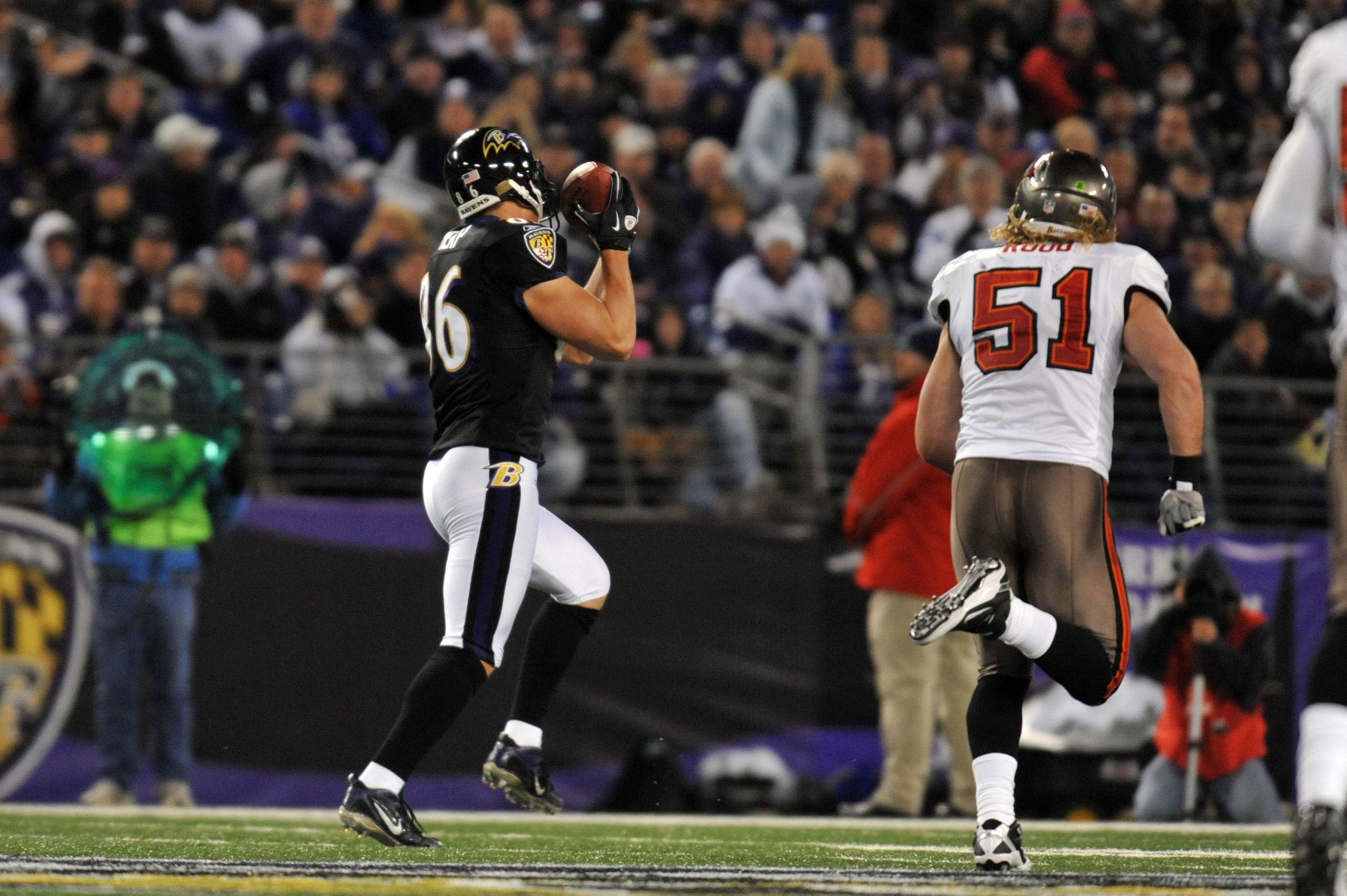 BALTIMORE, MD - NOVEMBER 28:  Todd Heap #86 of the Baltimore Ravens runs a catch in for a touchdown against the Tampa Bay Buccaneers at M&T Bank Stadium on November 28, 2010 in Baltimore, Maryland. The Ravens lead the Buccaneers at the half 17-3. (Photo b