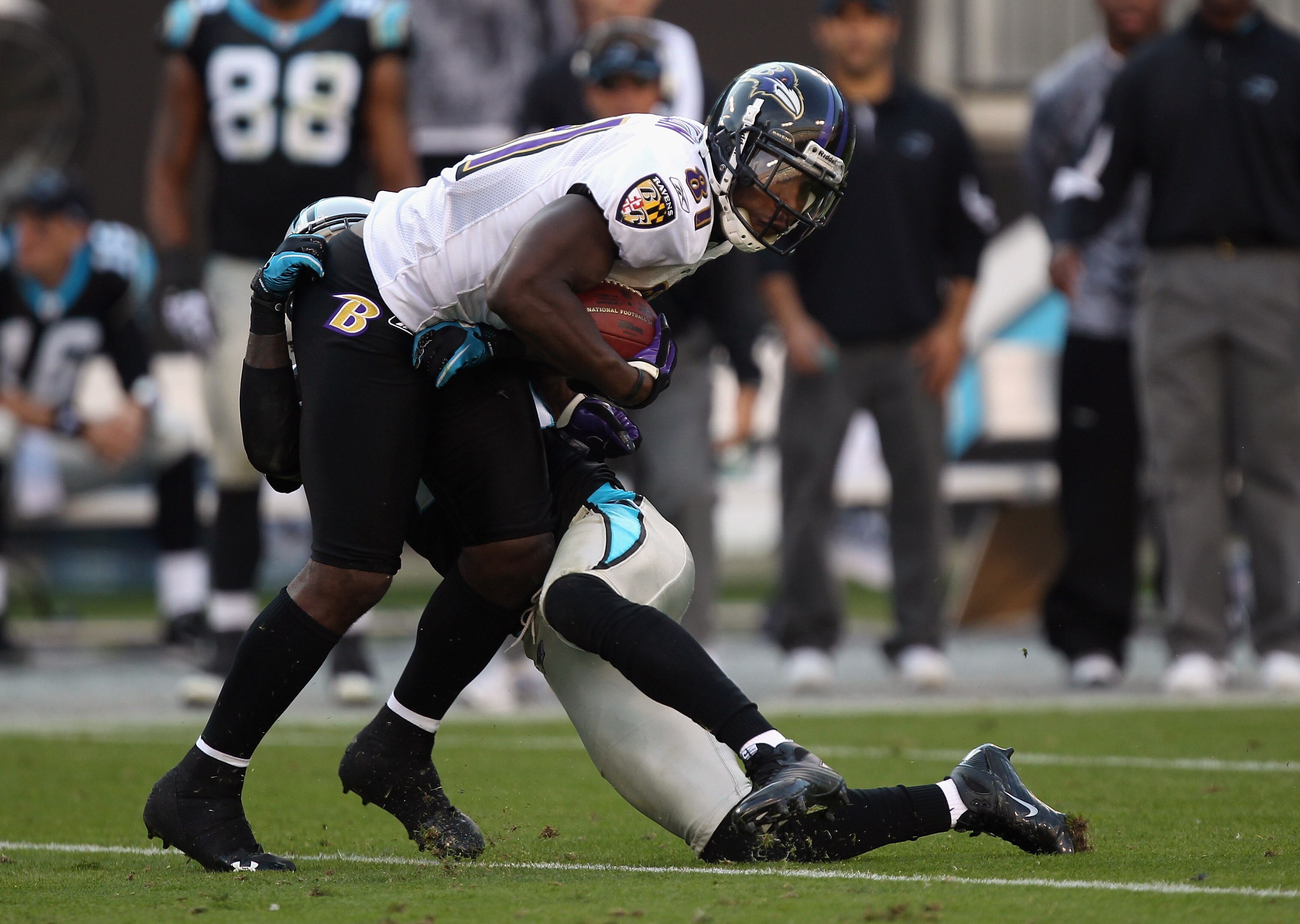 CHARLOTTE, NC - NOVEMBER 21:  Anquan Boldin #81 of the Baltimore Ravens tries to get away from a tackle against the Carolina Panthers at Bank of America Stadium on November 21, 2010 in Charlotte, North Carolina.  (Photo by Streeter Lecka/Getty Images)