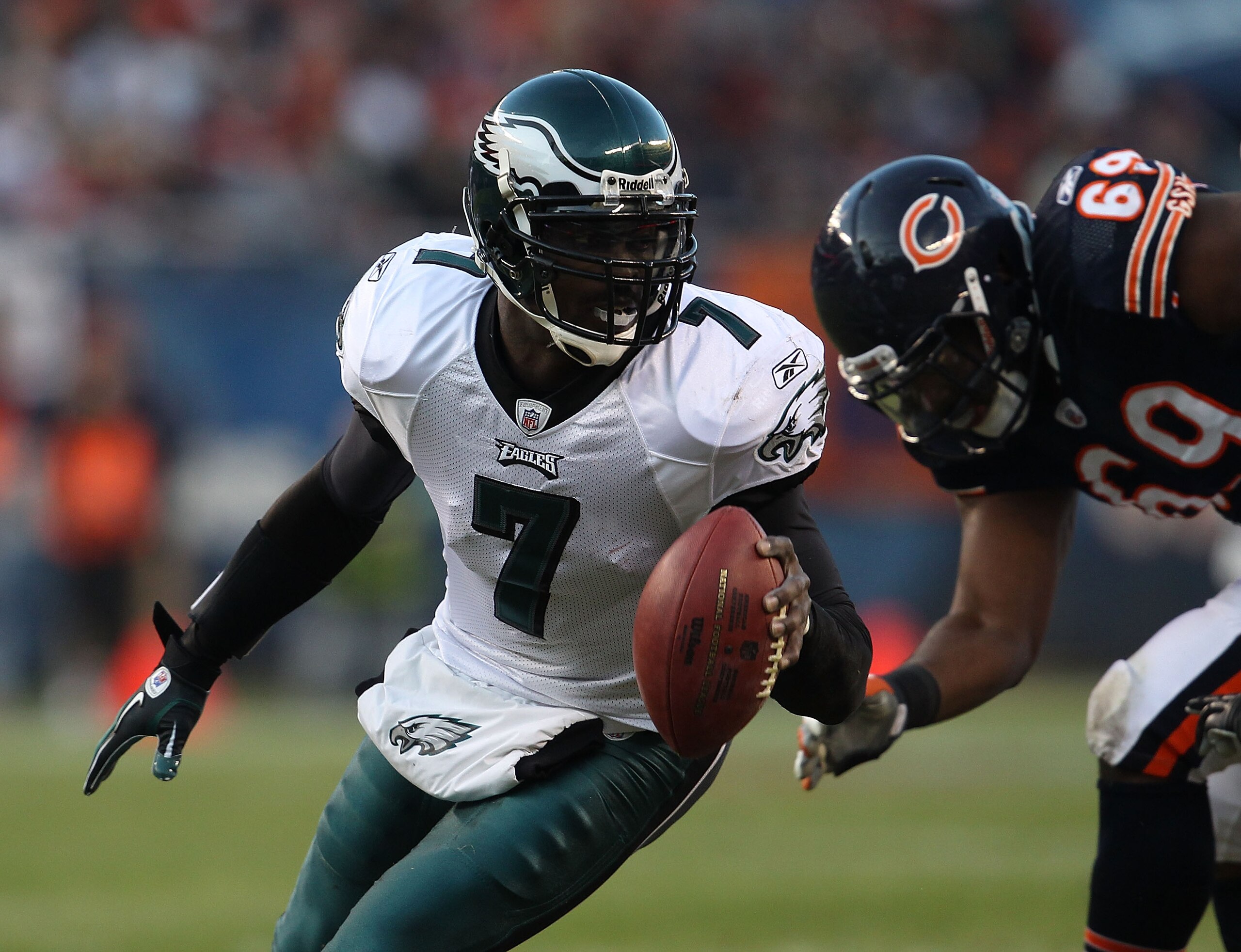 CHICAGO - NOVEMBER 28: Michael Vick #7 of the Philadelphia Eagles turns to avoid a rush by Henry Melton #69 of the Chicago Bears at Soldier Field on November 28, 2010 in Chicago, Illinois. (Photo by Jonathan Daniel/Getty Images)