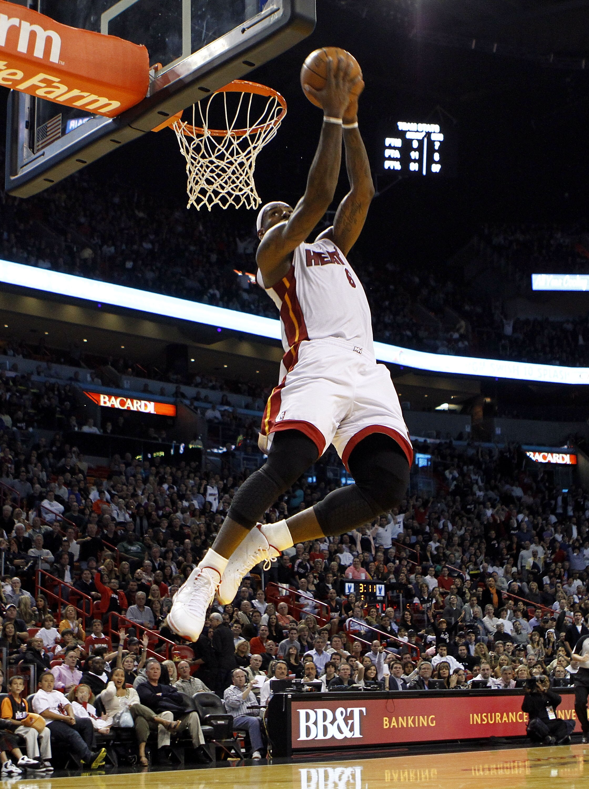 MIAMI - NOVEMBER 06:  Forward LeBron James #6 of the Miami Heat dunks against the New Jersey Nets  at American Airlines Arena on November 6, 2010 in Miami, Florida. NOTE TO USER: User expressly acknowledges and agrees that, by downloading and or using thi