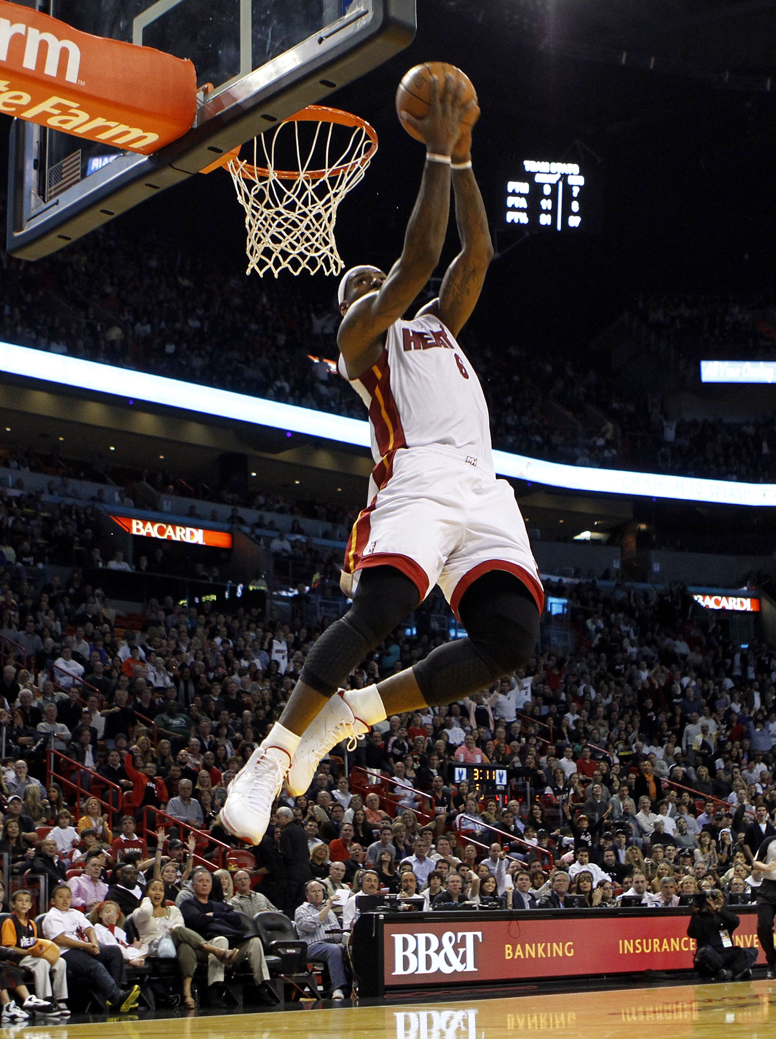 MIAMI - NOVEMBER 06:  Forward LeBron James #6 of the Miami Heat dunks against the New Jersey Nets  at American Airlines Arena on November 6, 2010 in Miami, Florida. NOTE TO USER: User expressly acknowledges and agrees that, by downloading and or using thi