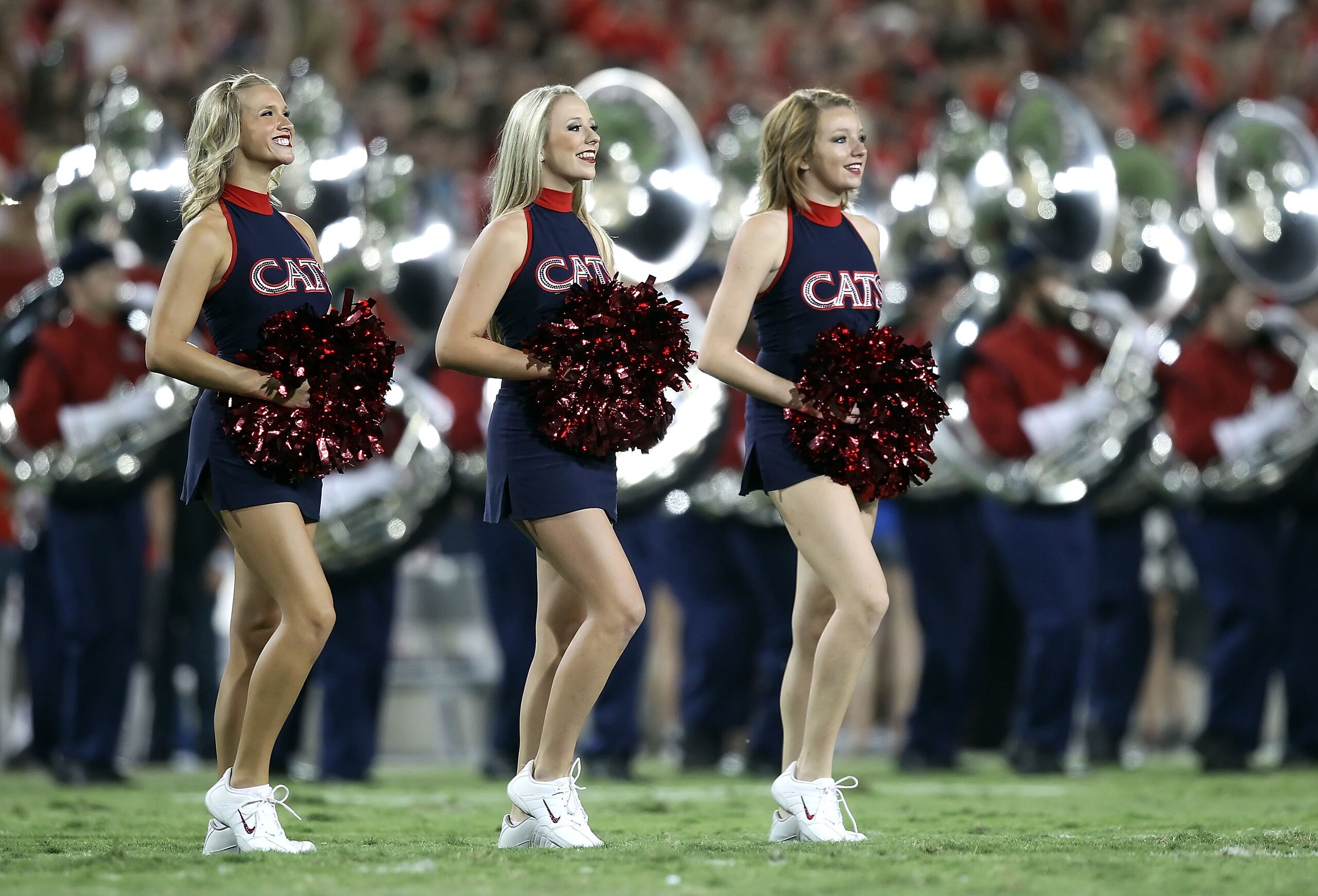TUCSON, AZ - SEPTEMBER 25:  The Arizona Wildcats cheerleaders perform before the college football game against the California Bears at Arizona Stadium on September 25, 2010 in Tucson, Arizona.   The Wildcats defeated the Golden Bears 10-9.  (Photo by Chri
