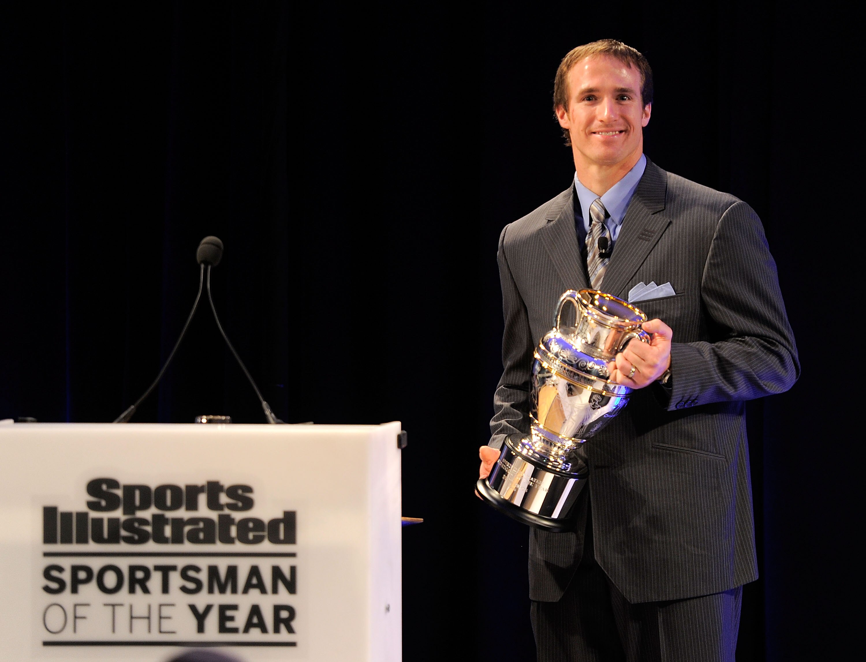 NEW YORK, NY - NOVEMBER 30:  Sportsman of the Year Drew Brees of the New Orleans Saints speaks during the 2010 Sports Illustrated Sportsman of the Year Celebration  at IAC Building on November 30, 2010 in New York City.  (Photo by Jemal Countess/Getty Ima