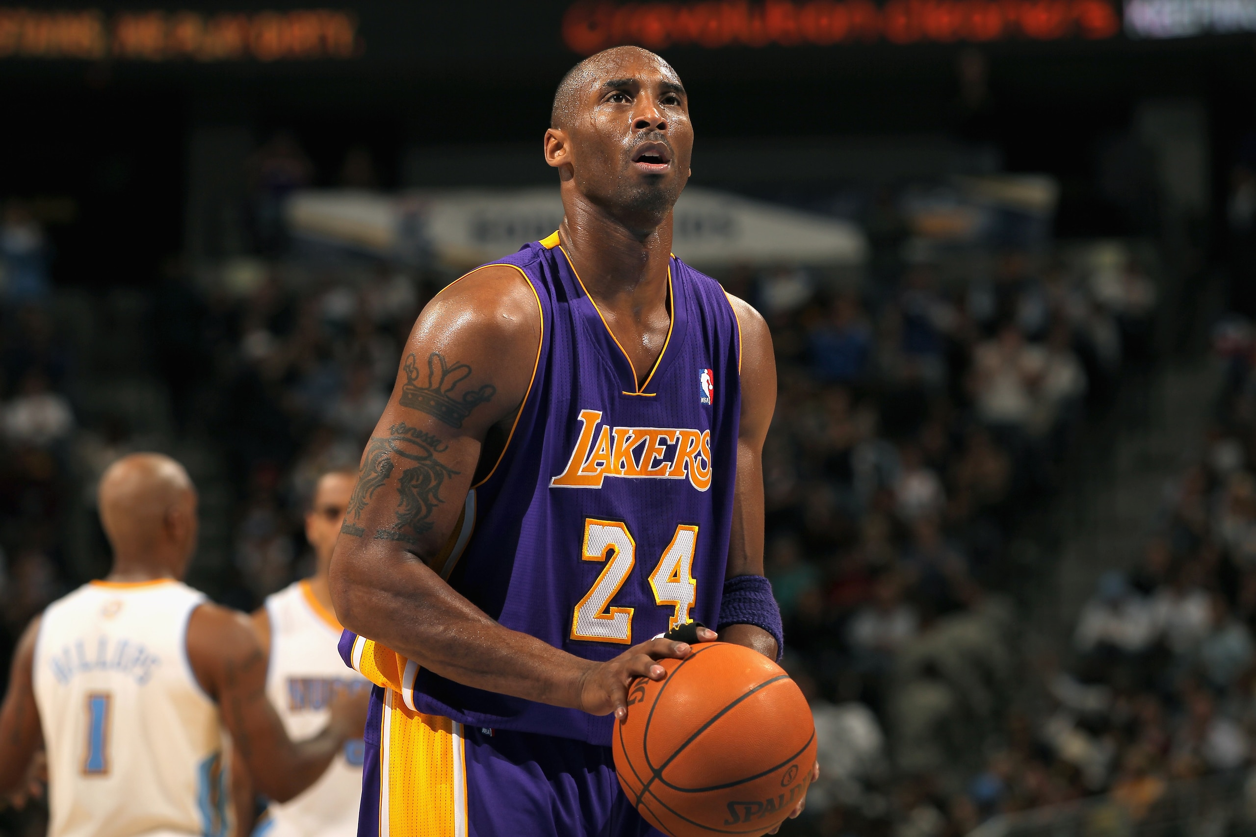 DENVER - NOVEMBER 11:  Kobe Bryant #24 of the Los Angeles Lakers takes a free throw against the Denver Nuggets at the Pepsi Center on November 11, 2010 in Denver, Colorado. The Nuggets defeated the Lakers 118-112.  NOTE TO USER: User expressly acknowledge