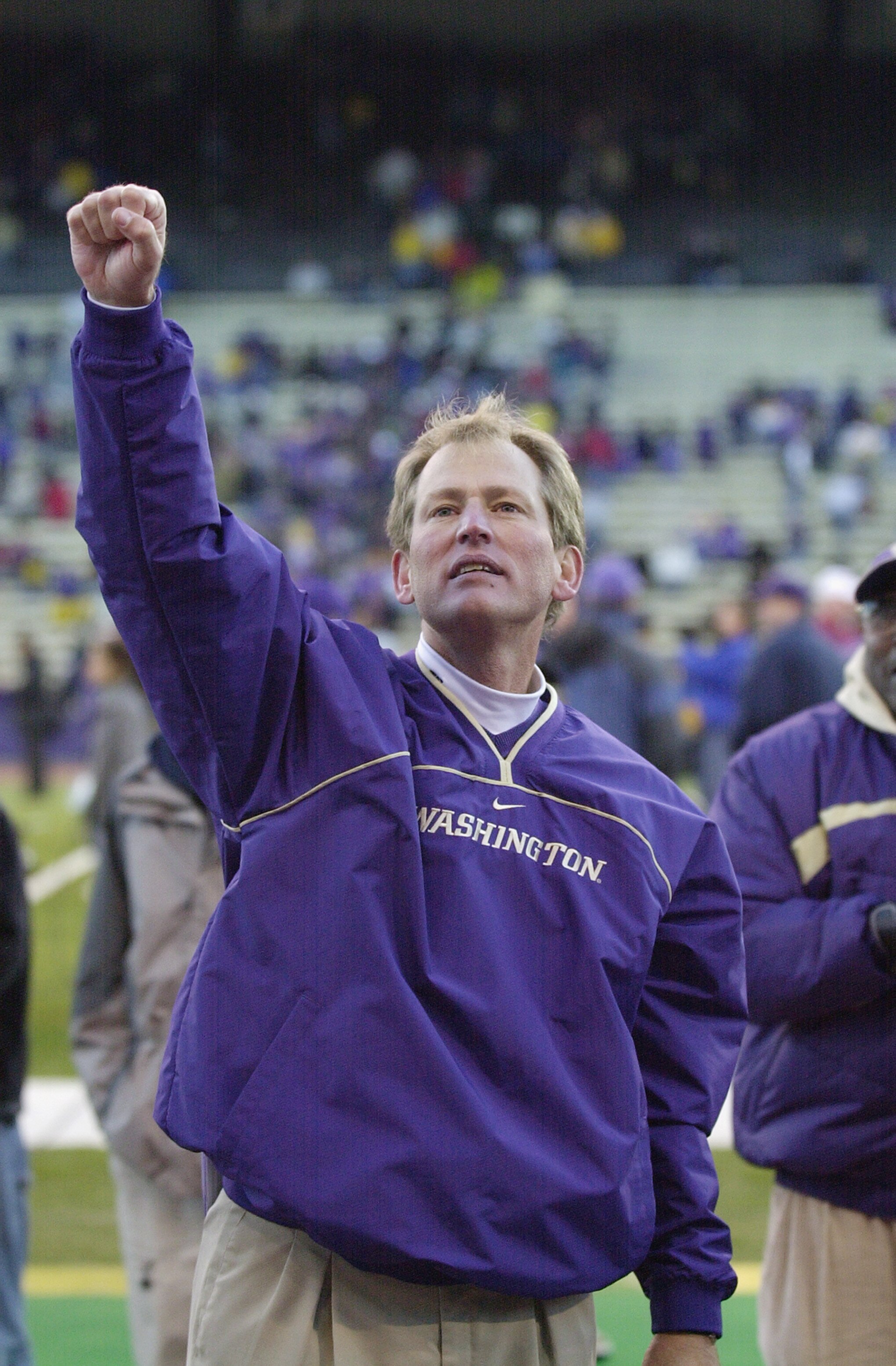 SEATTLE - NOVEMBER 17:  Head coach Rick Neuheisel of the Washington Huskies celebrates after winning the Pac-10 Conference football game against the Washington State Cougars on November 17, 2001 at Husky Stadium in Seattle, Washington. The Huskies defeate