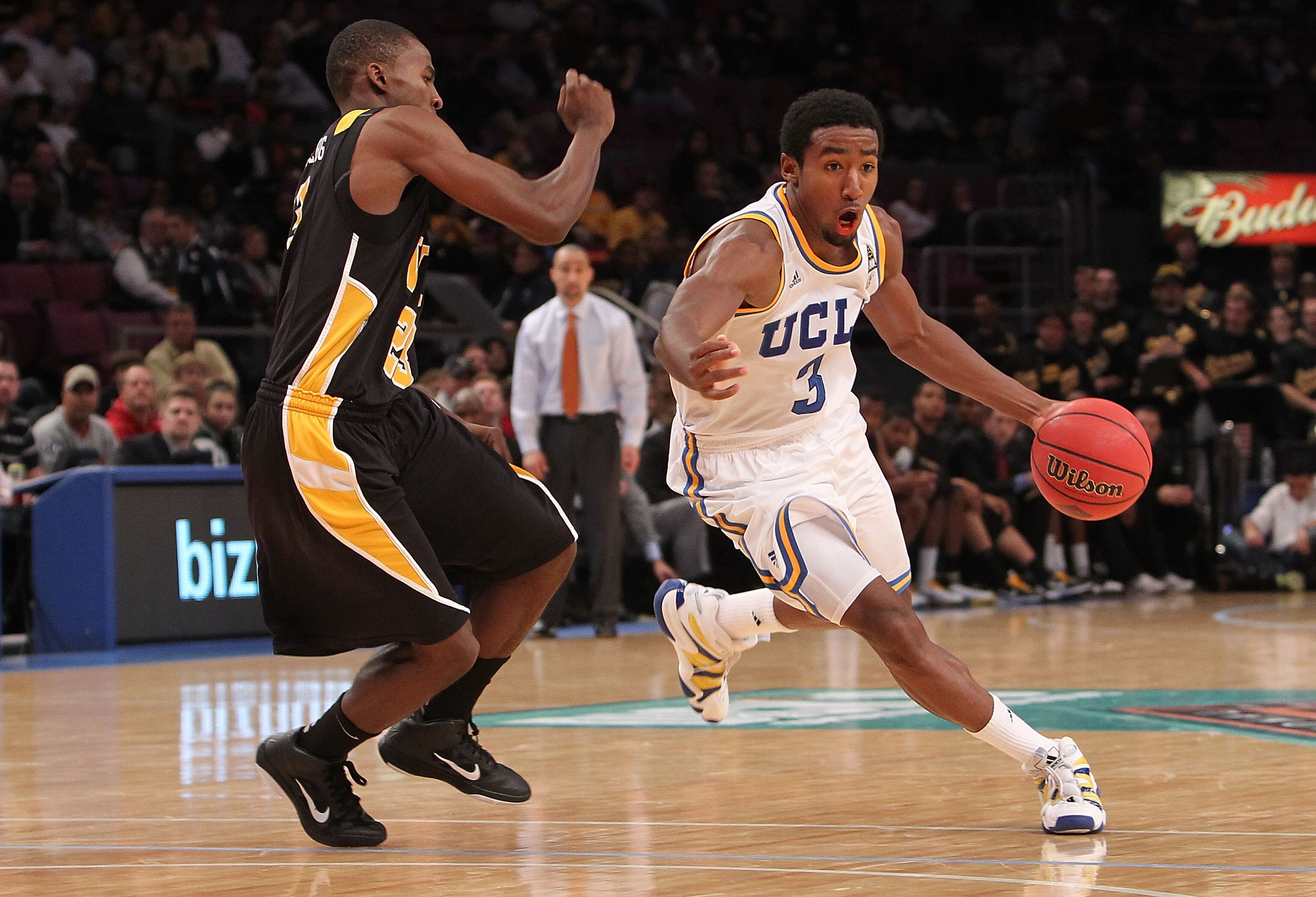 NEW YORK - NOVEMBER 26: Malcolm Lee #3 of the UCLA Bruins dribbles the ball against Rob Brandenberg #23 of the Virginia Commonwealth Rams during their consolation game at Madison Square Garden on November 26, 2010 in New York City.  (Photo by Nick Laham/G