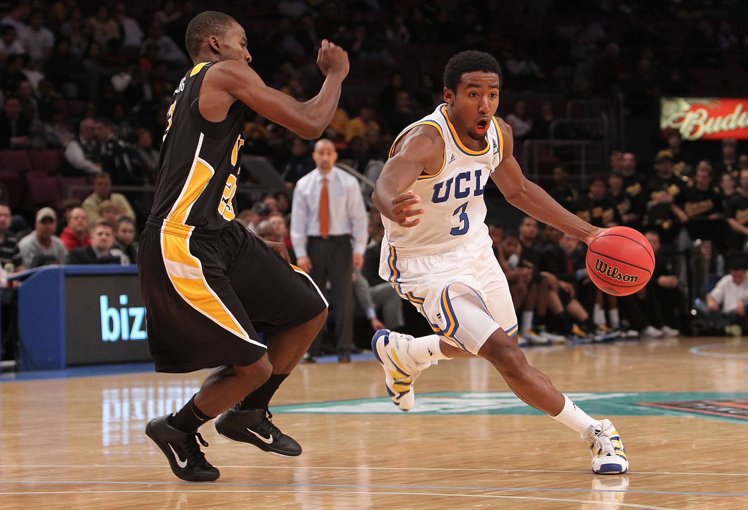 NEW YORK - NOVEMBER 26: Malcolm Lee #3 of the UCLA Bruins dribbles the ball against Rob Brandenberg #23 of the Virginia Commonwealth Rams during their consolation game at Madison Square Garden on November 26, 2010 in New York City.  (Photo by Nick Laham/G