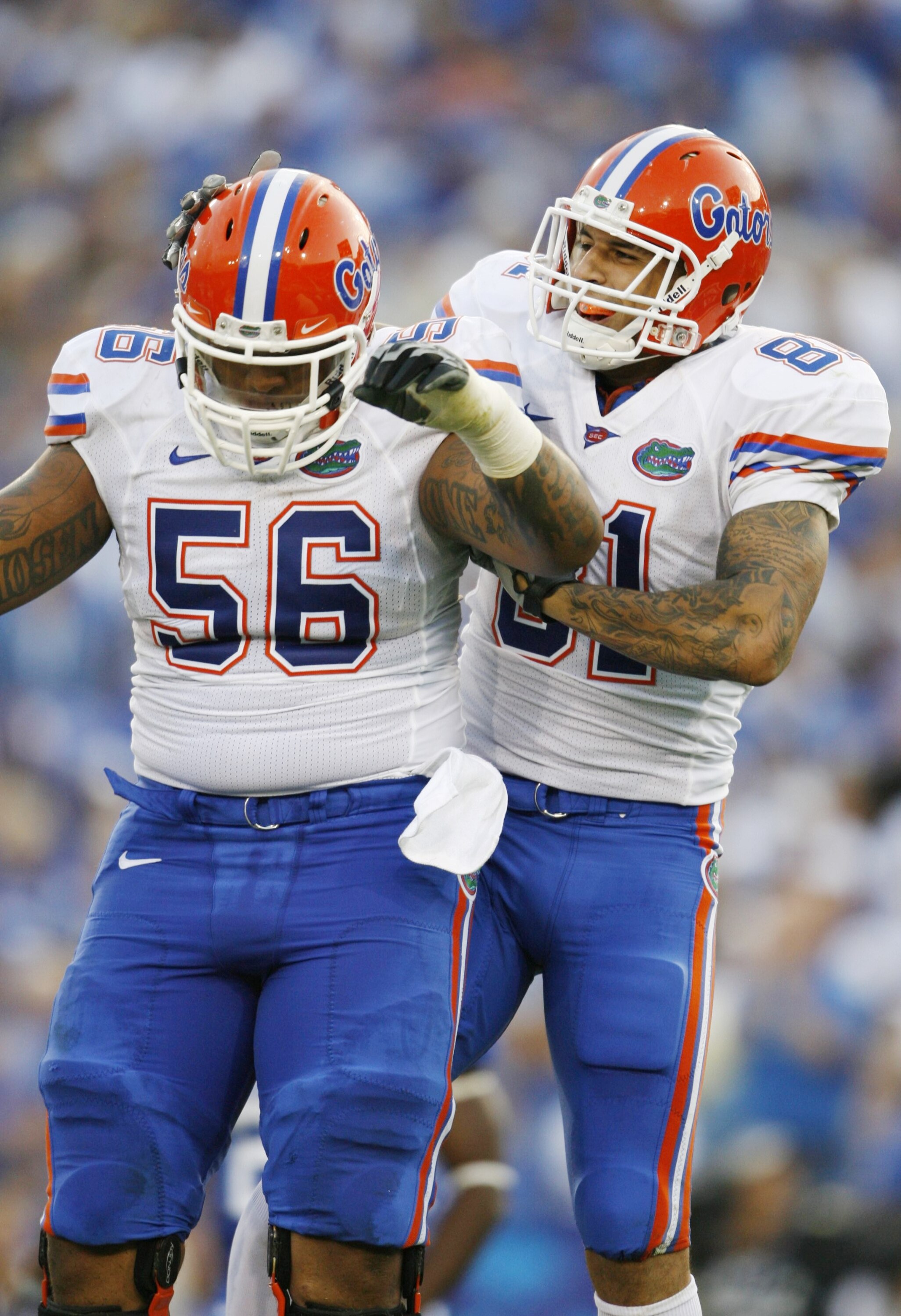 LEXINGTON, KY - SEPTEMBER 26:   Tight end Aaron Hernandez #81 celebrates his touchdown with teammate Maurkice Pouncey #56 in the first quarter of the game against the Kentucky Wildcats at Commonwealth Stadium on September 26, 2009 in Lexington, Kentucky.