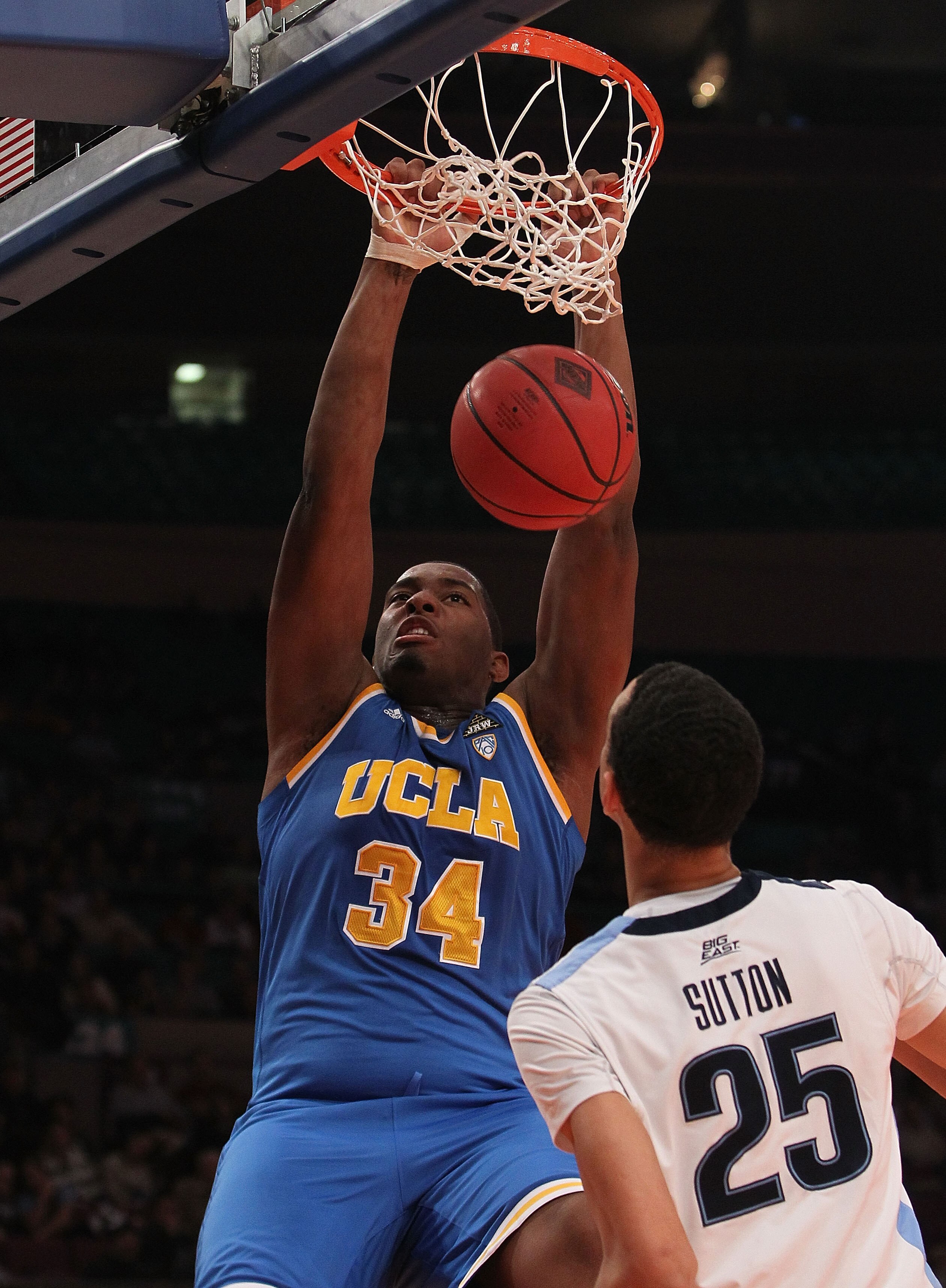 NEW YORK - NOVEMBER 24: Joshua Smith #34 of the UCLA Bruins dunks the ball against the Villanova Wildcats during their preseason NIT semifinal at Madison Square Garden on November 24, 2010 in New York City.  (Photo by Nick Laham/Getty Images)