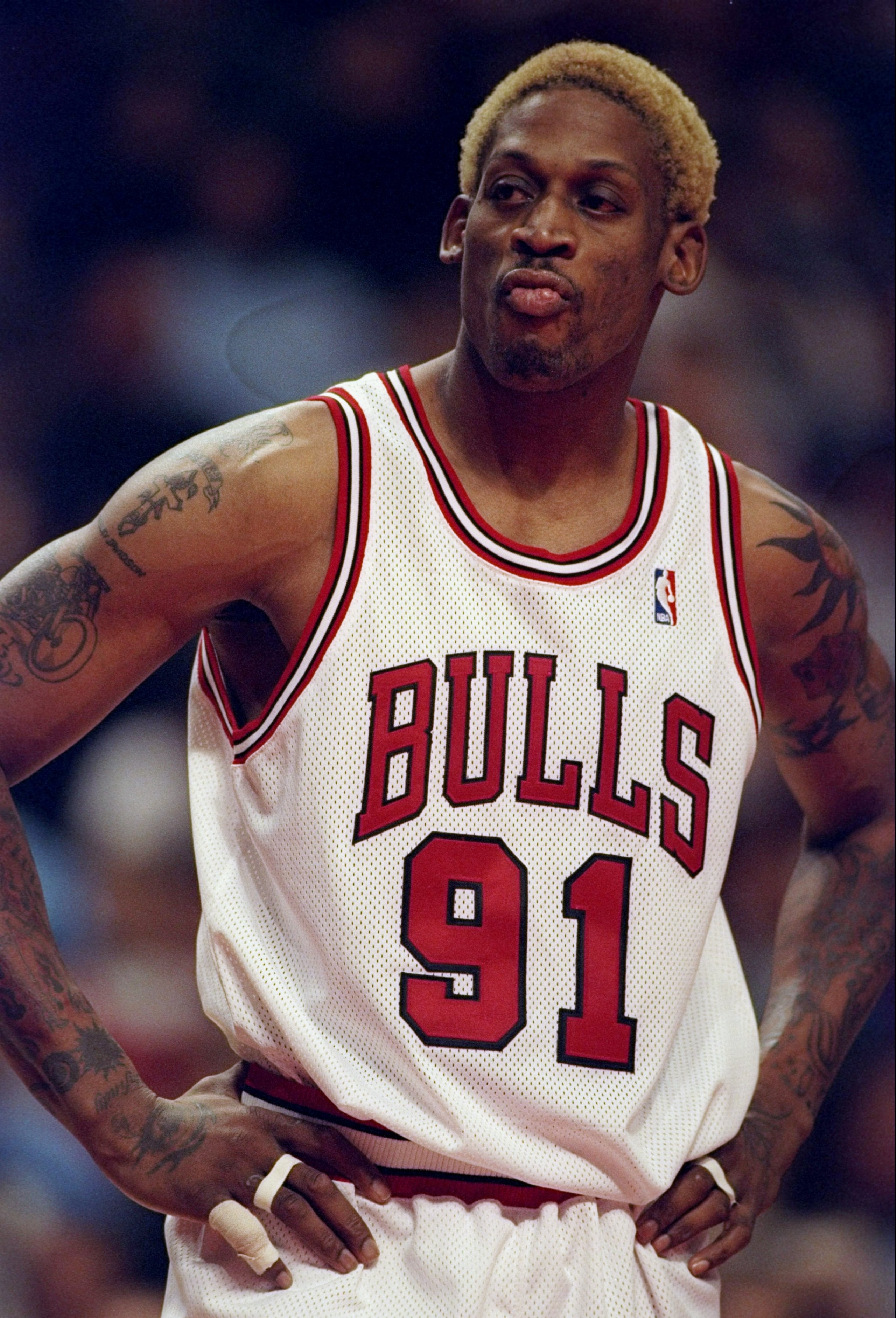 14 Nov 1997: Forward Dennis Rodman of the Chicago Bulls stands on the court during a game against the Charlotte Hornets at the United Center in Chicago, Illinois. The Bulls won the game 105-92. Mandatory Credit: Jonathan Daniel /Allsport 14 Nov 1997: Forward Dennis Rodman of the Chicago Bulls stands on the court during a game against the Charlotte Hornets at the United Center in Chicago, Illinois. The Bulls won the game 105-92. Mandatory Credit: Jonathan Daniel /Allsport