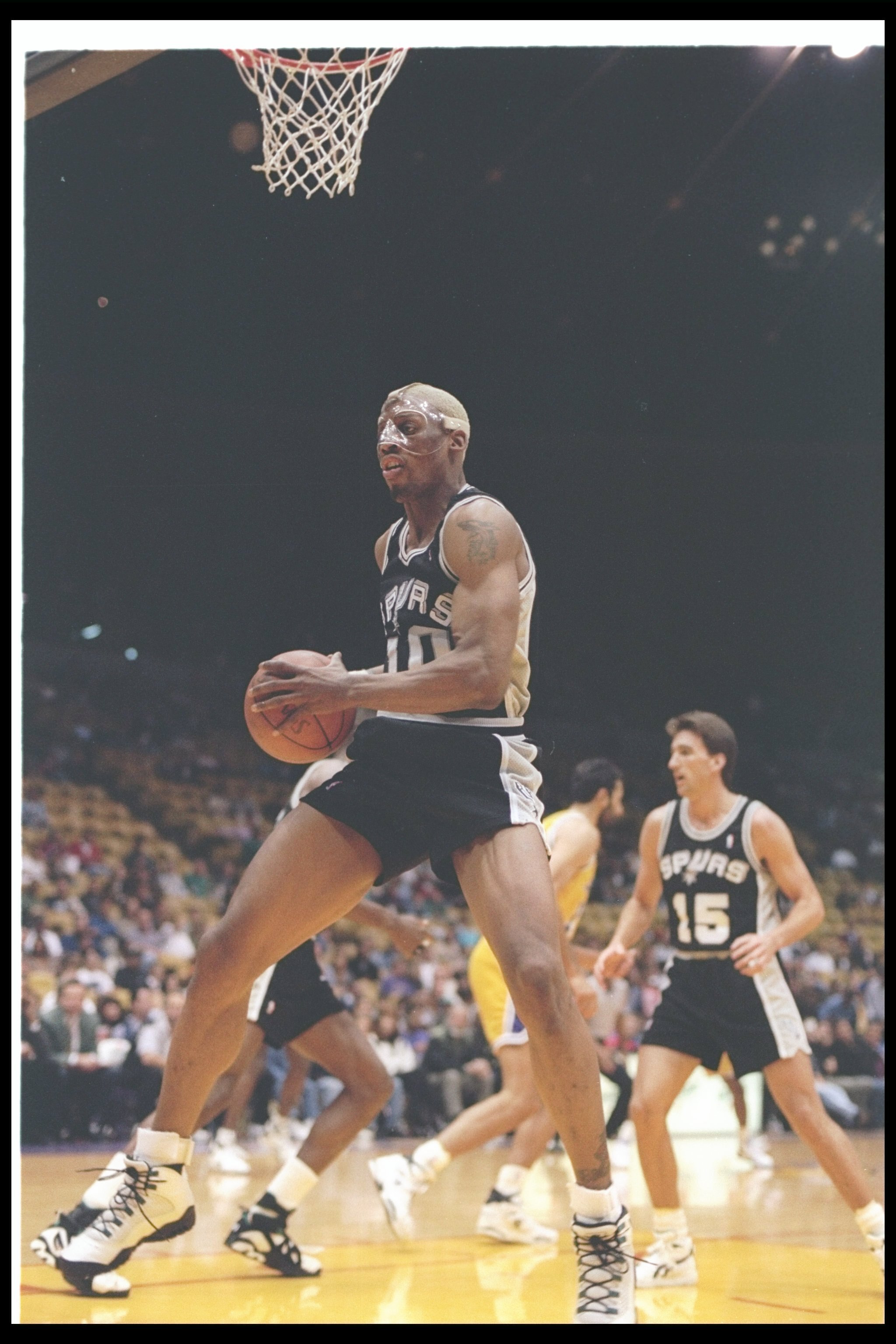 25 Mar 1994:  Forward Dennis Rodman of the San Antonio Spurs moves the ball during a game against the Los Angeles Lakers at the Great Western Forum in Inglewood, California. Mandatory Credit: J. D. Cuban  /Allsport Mandatory Credit: J. D. Cuban  /Allsport