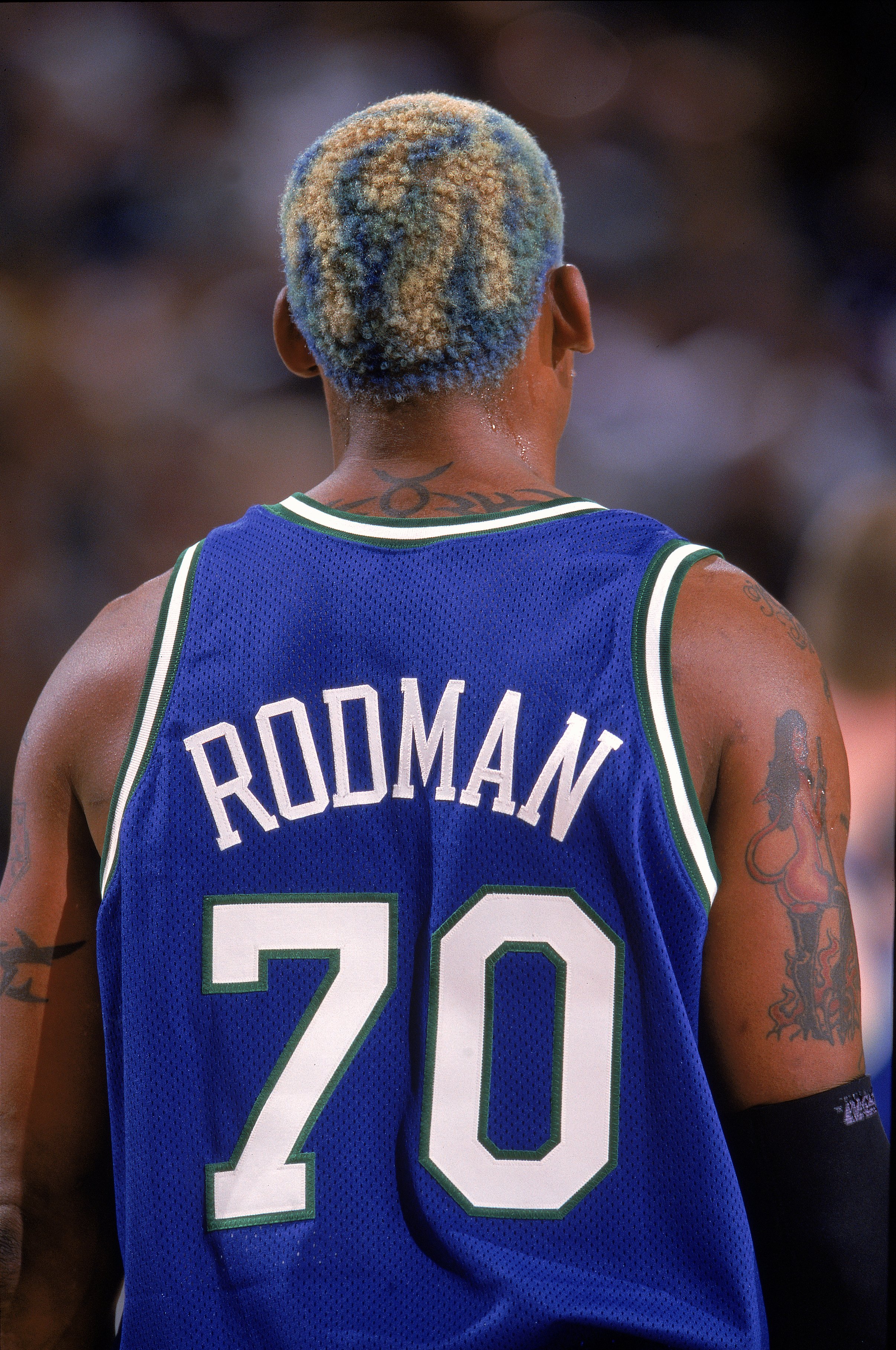 7 Mar 2000: A back view of Dennis Rodman #70 of the Dallas Mavericks as he walks on the court during a game against the Seattle SuperSonics at the Key Arena in Seattle, Washington. The Sonics defeated the Mavericks 101-86.  Mandatory Credit: Ronald Martin