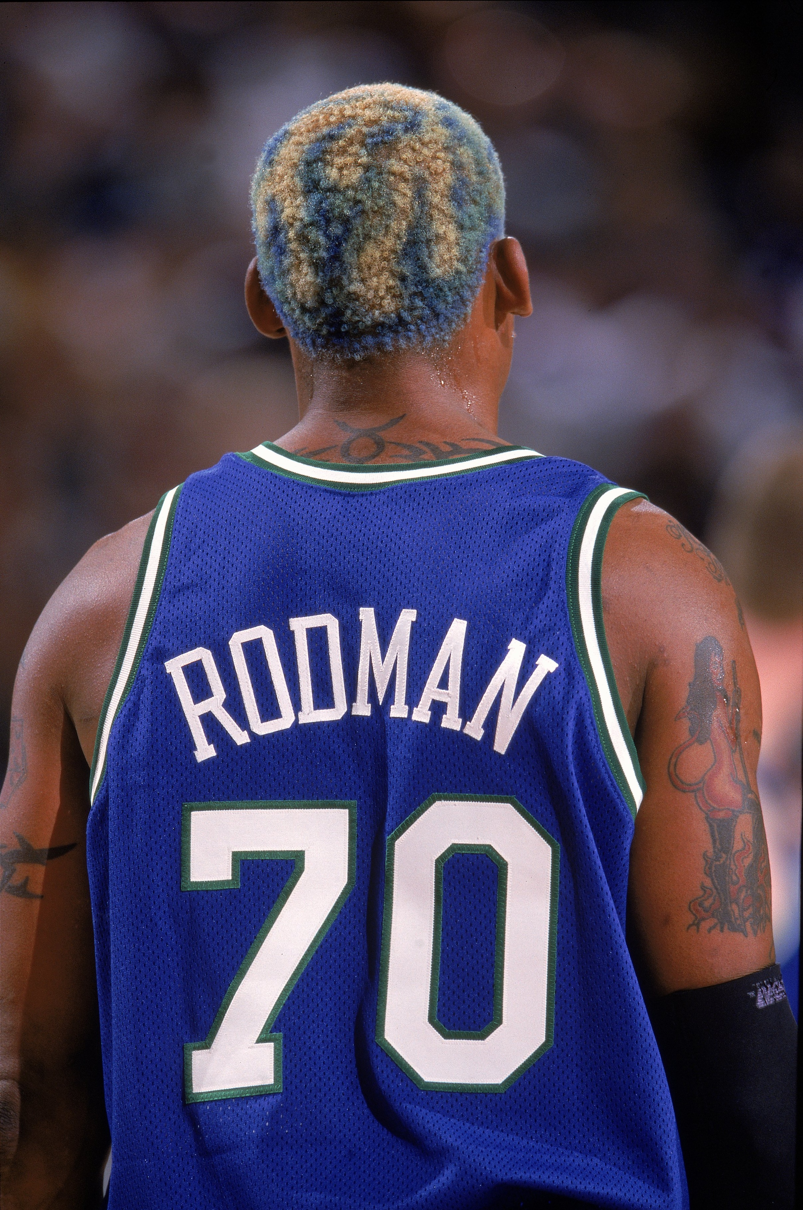 7 Mar 2000: A back view of Dennis Rodman #70 of the Dallas Mavericks as he walks on the court during a game against the Seattle SuperSonics at the Key Arena in Seattle, Washington. The Sonics defeated the Mavericks 101-86. Mandatory Credit: Ronald Martin 7 Mar 2000: A back view of Dennis Rodman #70 of the Dallas Mavericks as he walks on the court during a game against the Seattle SuperSonics at the Key Arena in Seattle, Washington. The Sonics defeated the Mavericks 101-86. Mandatory Credit: Ronald Martin
