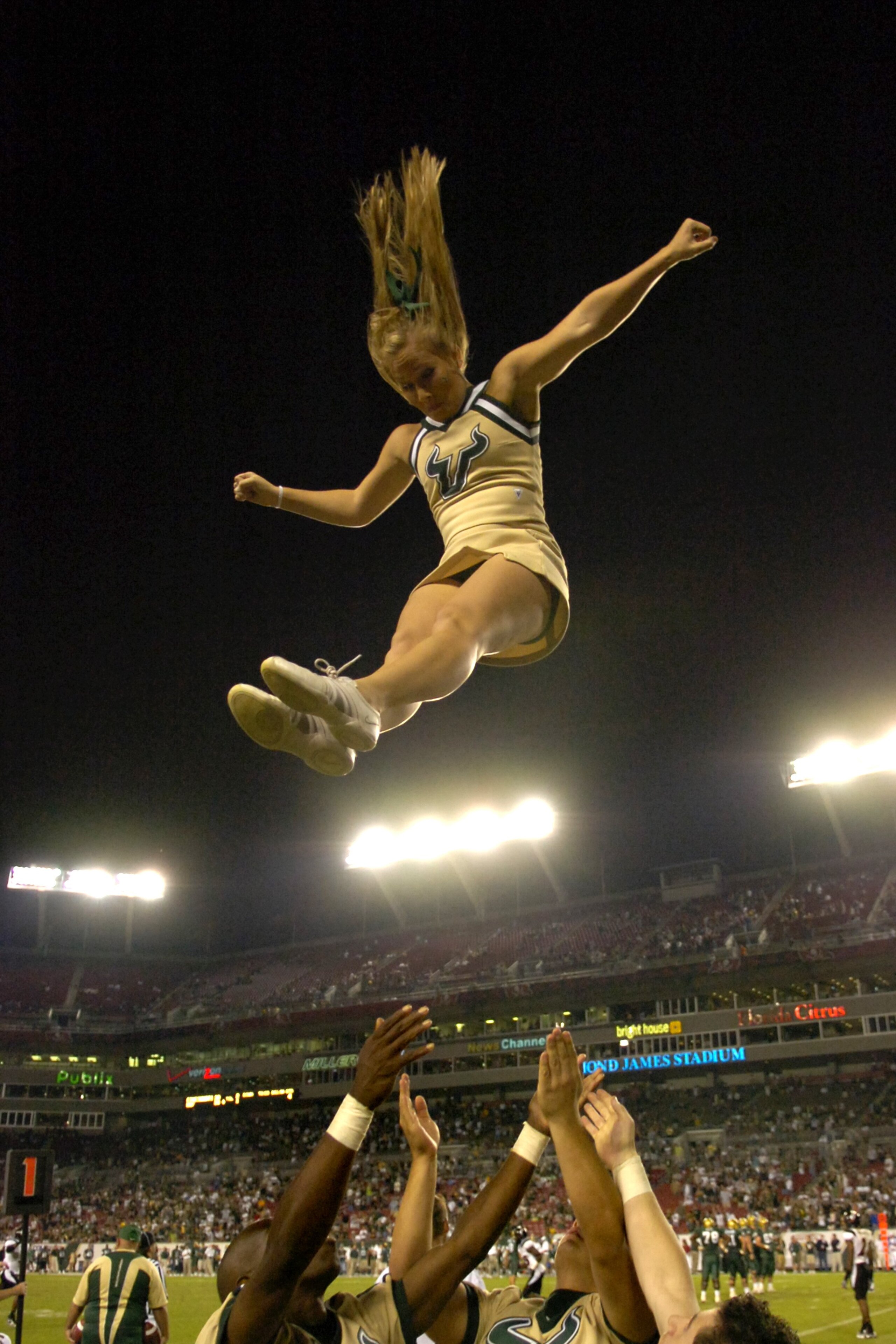 TAMPA, FL - NOVEMBER 3: A cheerleader from the University of South Florida Bulls entertains during play against the Cincinnati Bearcats at Raymond James Stadium on November 3, 2007 in Tampa, Florida.  Cincinnati won 38 - 33. (Photo by Al Messerschmidt/Get