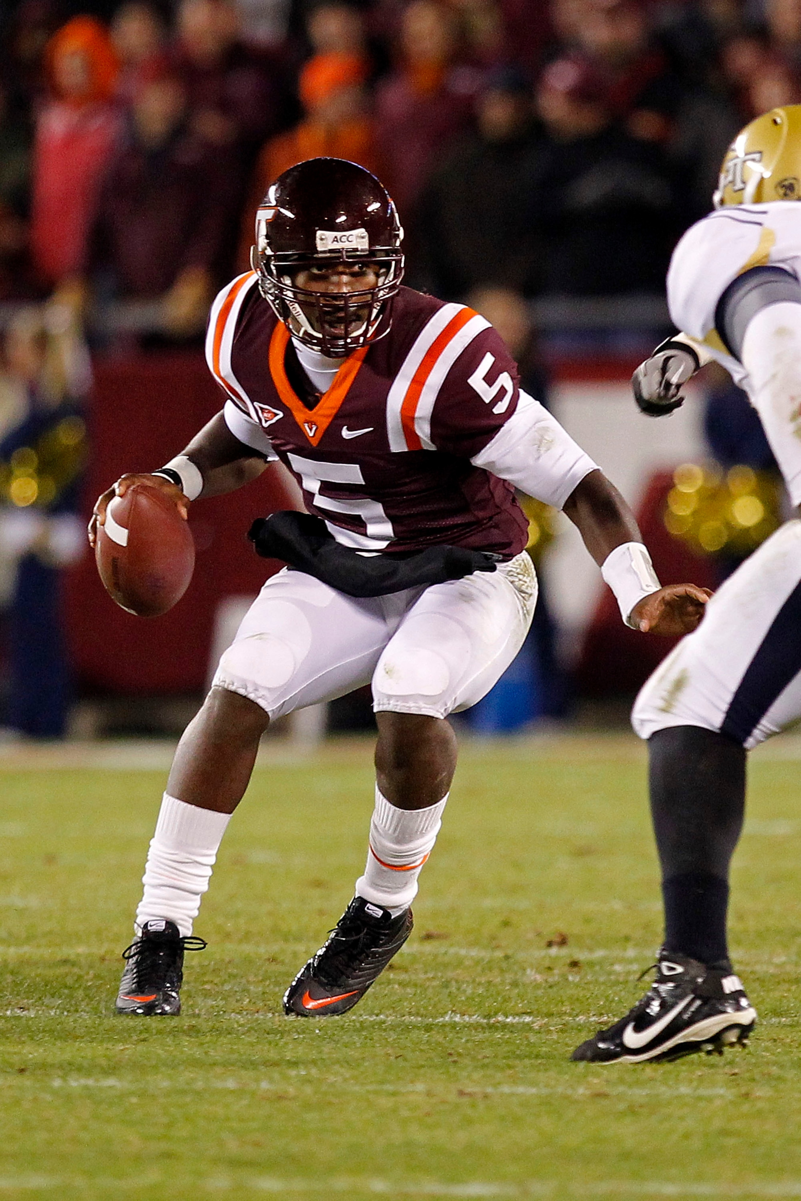BLACKSBURG, VA - NOVEMBER 04:  Quarterback Tyrod Taylor #5 of the Virginia Tech Hokies runs with the ball against the Georgia Tech Yellow Jackets at Lane Stadium on November 4, 2010 in Blacksburg, Virginia.  (Photo by Geoff Burke/Getty Images)