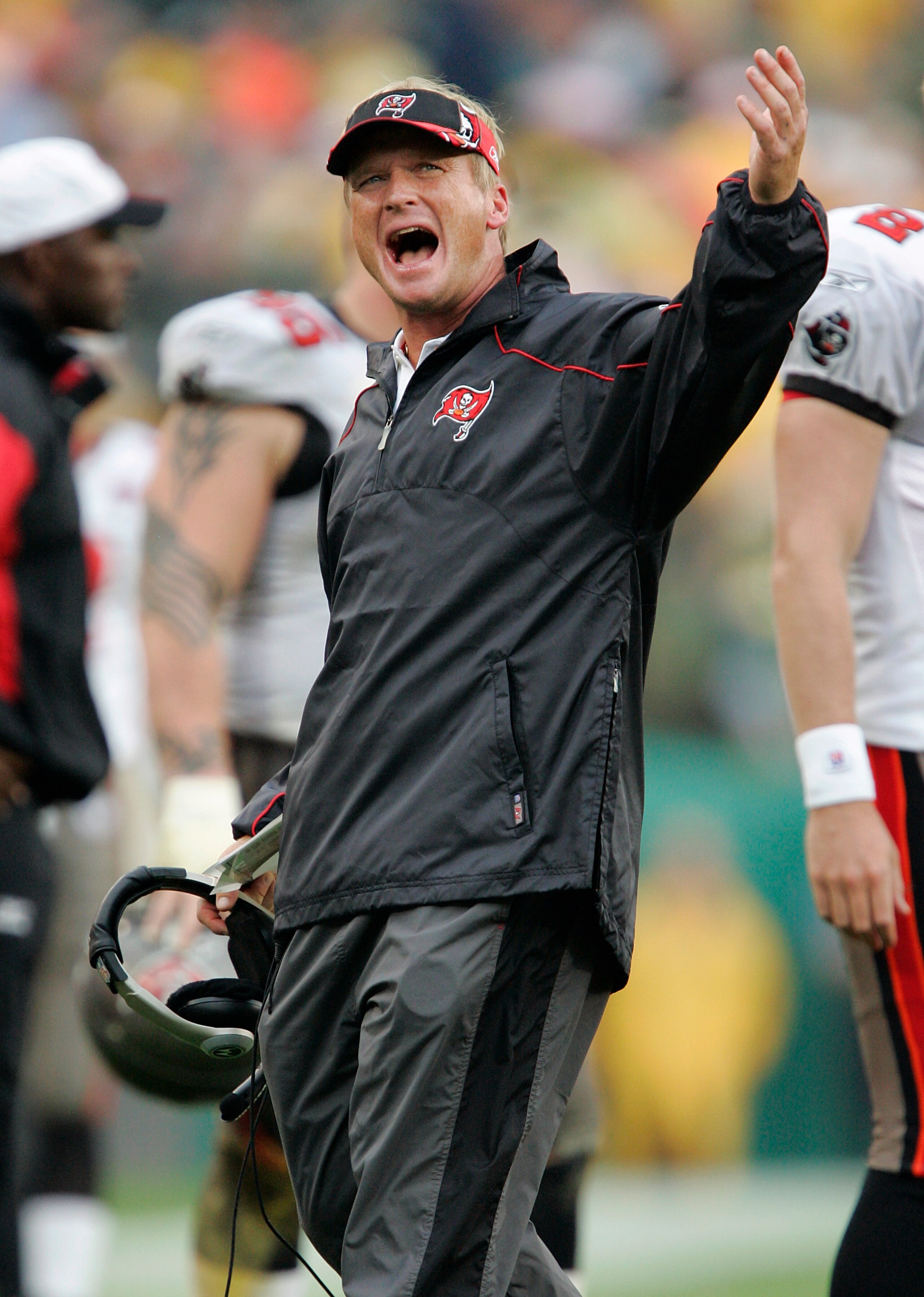 GREEN BAY, WI - SEPTEMBER 25:  Head coach Jon Gruden of the Tampa Bay Buccaneers waits for a verdict on a challenge against the Green Bay Packers in the third quarter on September 25, 2005 at Lambeau Field in Green Bay, Wisconsin.  The Bucs won 17-16.  (P