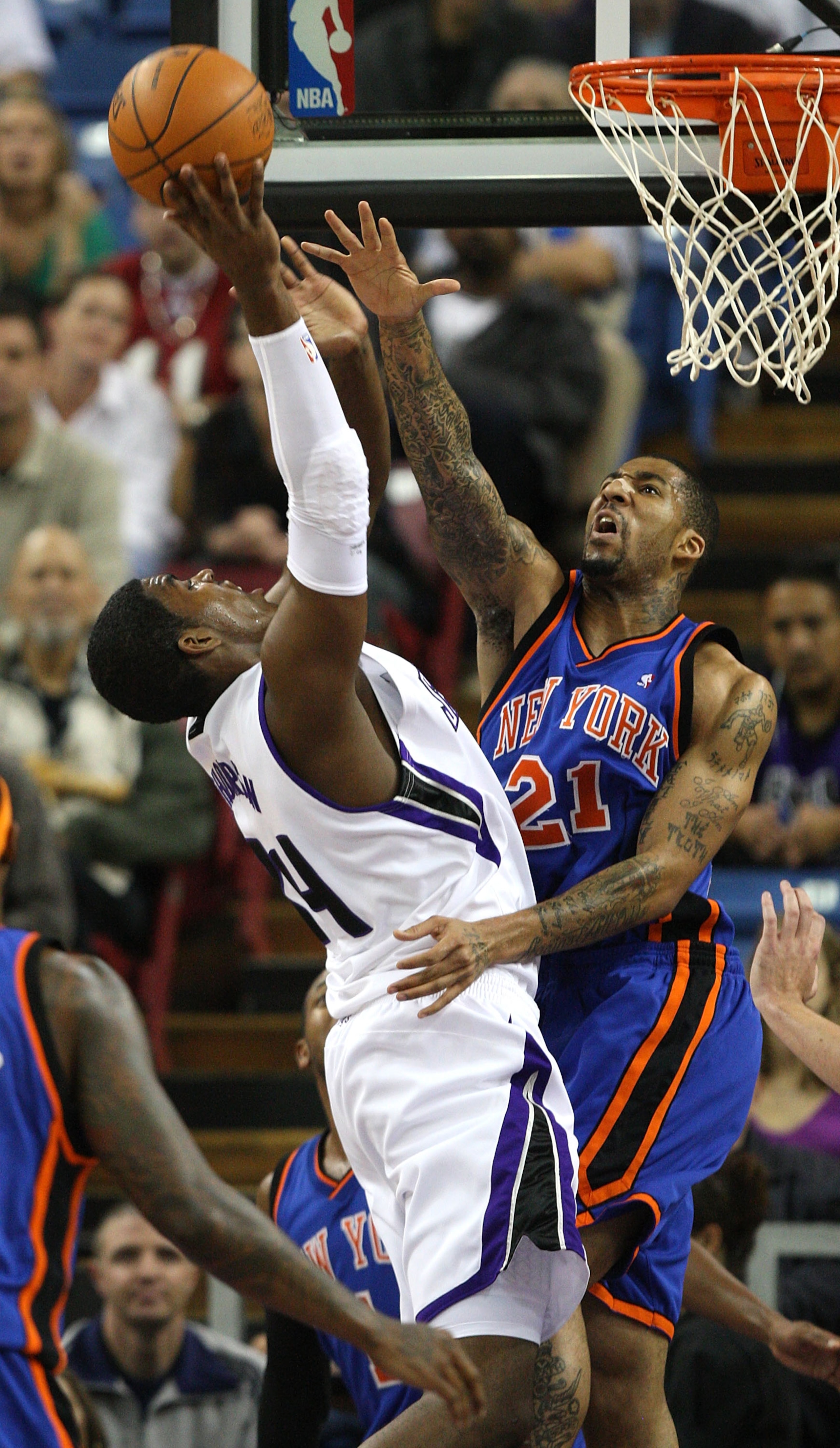 SACRAMENTO, CA - NOVEMBER 25: Jason Thompson #34 of the Sacramento Kings shoots against Wilson Chandler #21 of the New York Knicks on November 25, 2009 at ARCO Arena in Sacramento, California. NOTE TO USER: User expressly acknowledges and agrees that, by