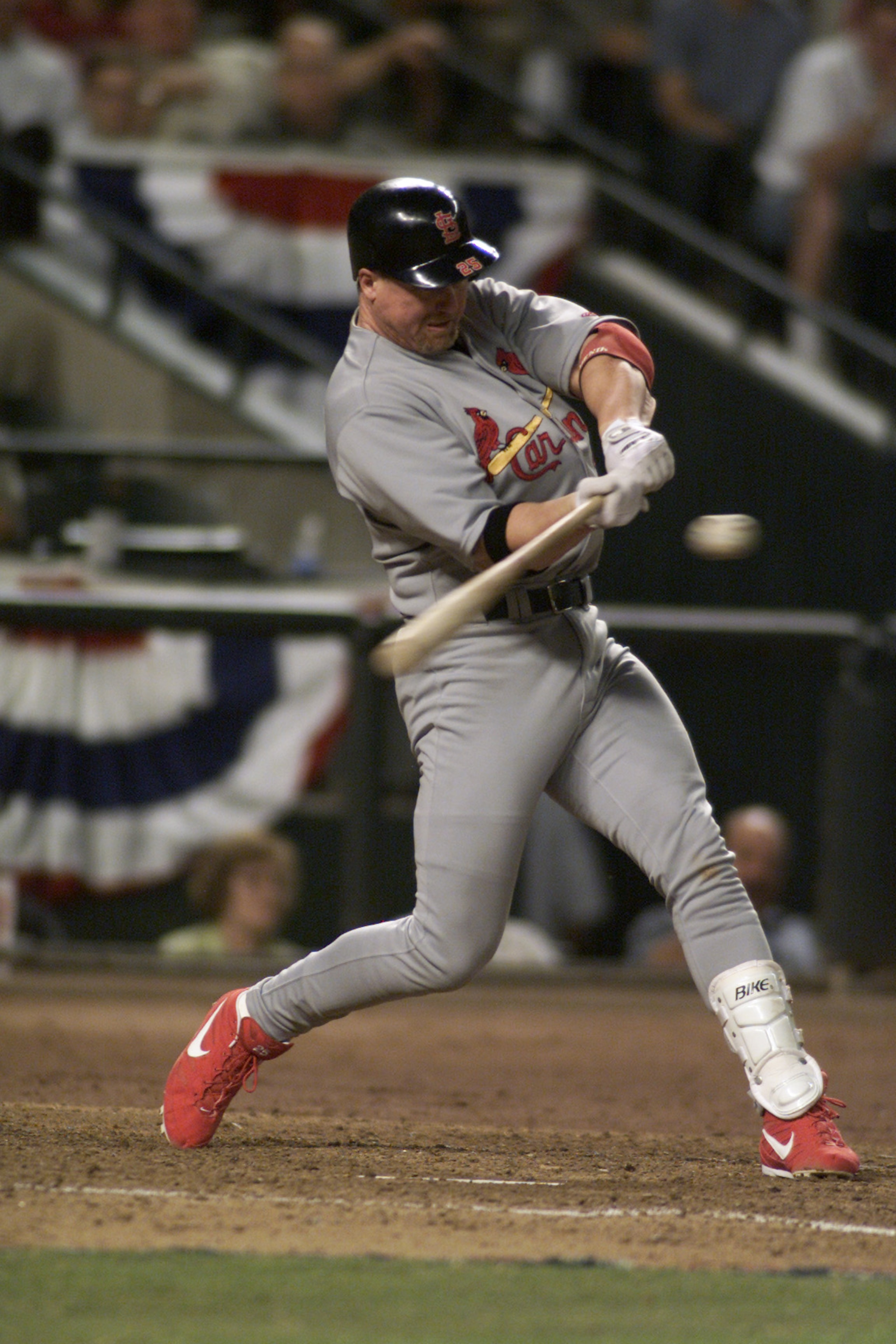 9 Oct 2001: Mark McGwire #25 of the St. Louis Cardinals swings at a pitch during game one of the National League West Divisional Series against the Arizona Diamondbacks at Bank One Ballpark in Phoenix, Arizona. The Diamondbacks win 1-0 over the Cardinals 9 Oct 2001: Mark McGwire #25 of the St. Louis Cardinals swings at a pitch during game one of the National League West Divisional Series against the Arizona Diamondbacks at Bank One Ballpark in Phoenix, Arizona. The Diamondbacks win 1-0 over the Cardinals