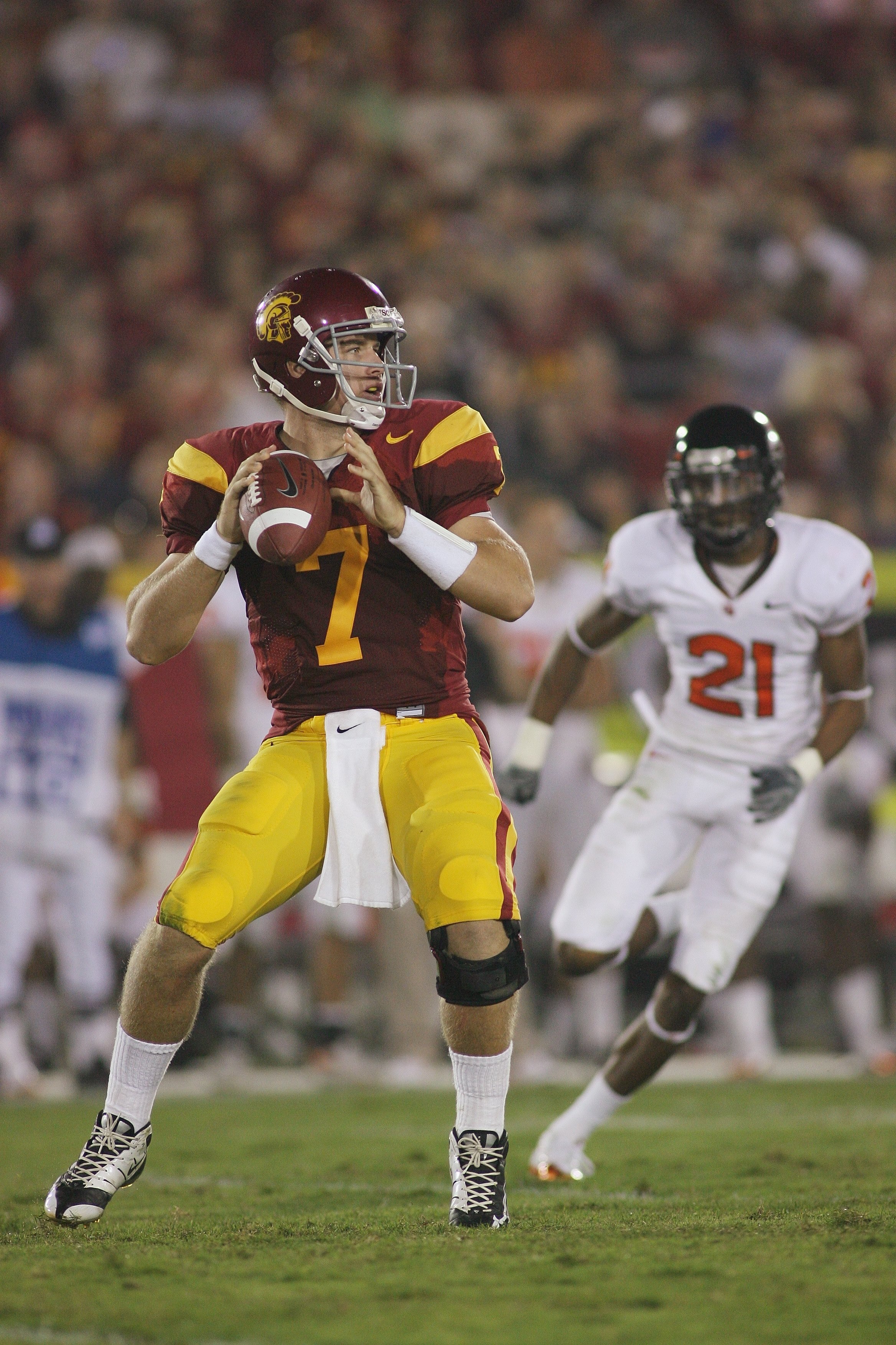 LOS ANGELES, CA - OCTOBER 24:  Matt Barkley #7 of the USC Trojans looks to pass the ball against the Oregon State Beavers on October 24, 2009 at the Los Angeles Coliseum in Los Angeles, California.  USC won 42-36.  (Photo by Jeff Golden/Getty Images)