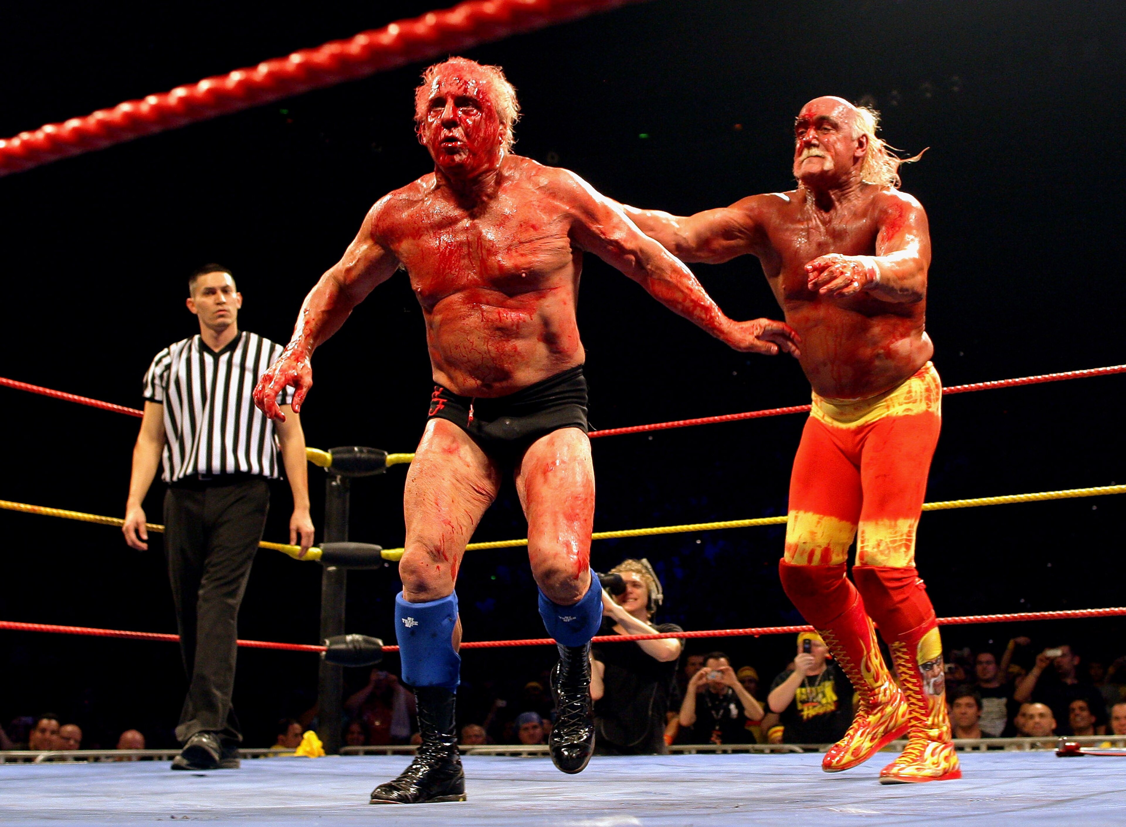 MELBOURNE, AUSTRALIA - NOVEMBER 21: Hulk Hogan throws his opponent Ric Flair to the ropes during Hulk Hogan's Hulkamania Tour at Rod Laver Arena on November 21, 2009 in Melbourne, Australia. (Photo by Mark Dadswell/Getty Images) MELBOURNE, AUSTRALIA - NOVEMBER 21: Hulk Hogan throws his opponent Ric Flair to the ropes during Hulk Hogan's Hulkamania Tour at Rod Laver Arena on November 21, 2009 in Melbourne, Australia. (Photo by Mark Dadswell/Getty Images)