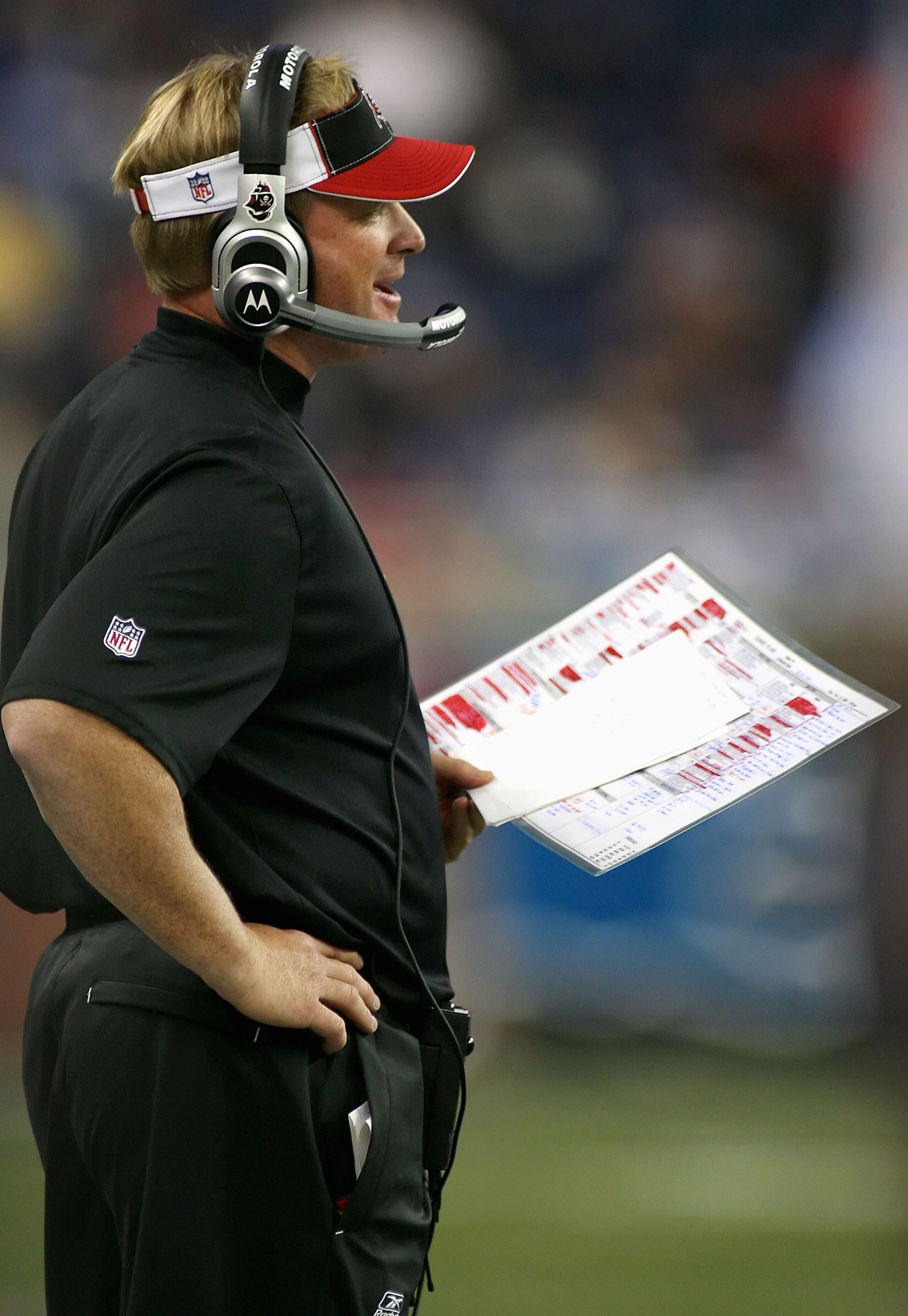 DETROIT - NOVEMBER 23:  Head coach Jon Gruden of the Tampa Bay Buccaneers calls a play against the Detroit Lions during the NFL game at Ford Field on November 23, 2008 in Detroit, Michigan. The Buccaneers defeated the Lions 38-20. (Photo by Christian Pete