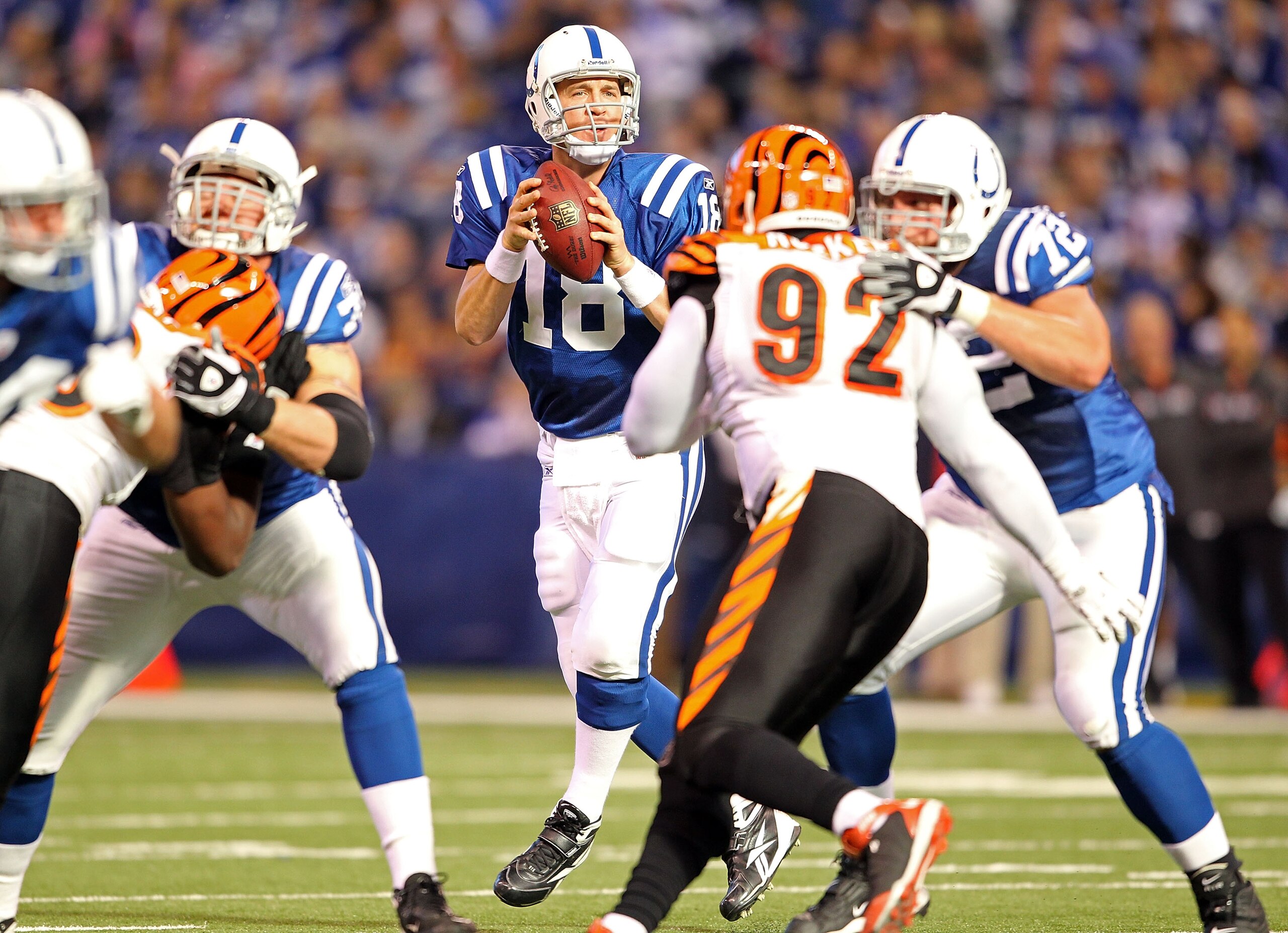INDIANAPOLIS - NOVEMBER 14: Peyton Manning #18 of the Indianapolis Colts looks to throw a pass during the NFL game against the Cincinnati Bengals at Lucas Oil Stadium on November 14, 2010 in Indianapolis, Indiana. The Colts won 23-17. (Photo by Andy Lyo INDIANAPOLIS - NOVEMBER 14: Peyton Manning #18 of the Indianapolis Colts looks to throw a pass during the NFL game against the Cincinnati Bengals at Lucas Oil Stadium on November 14, 2010 in Indianapolis, Indiana. The Colts won 23-17. (Photo by Andy Lyo