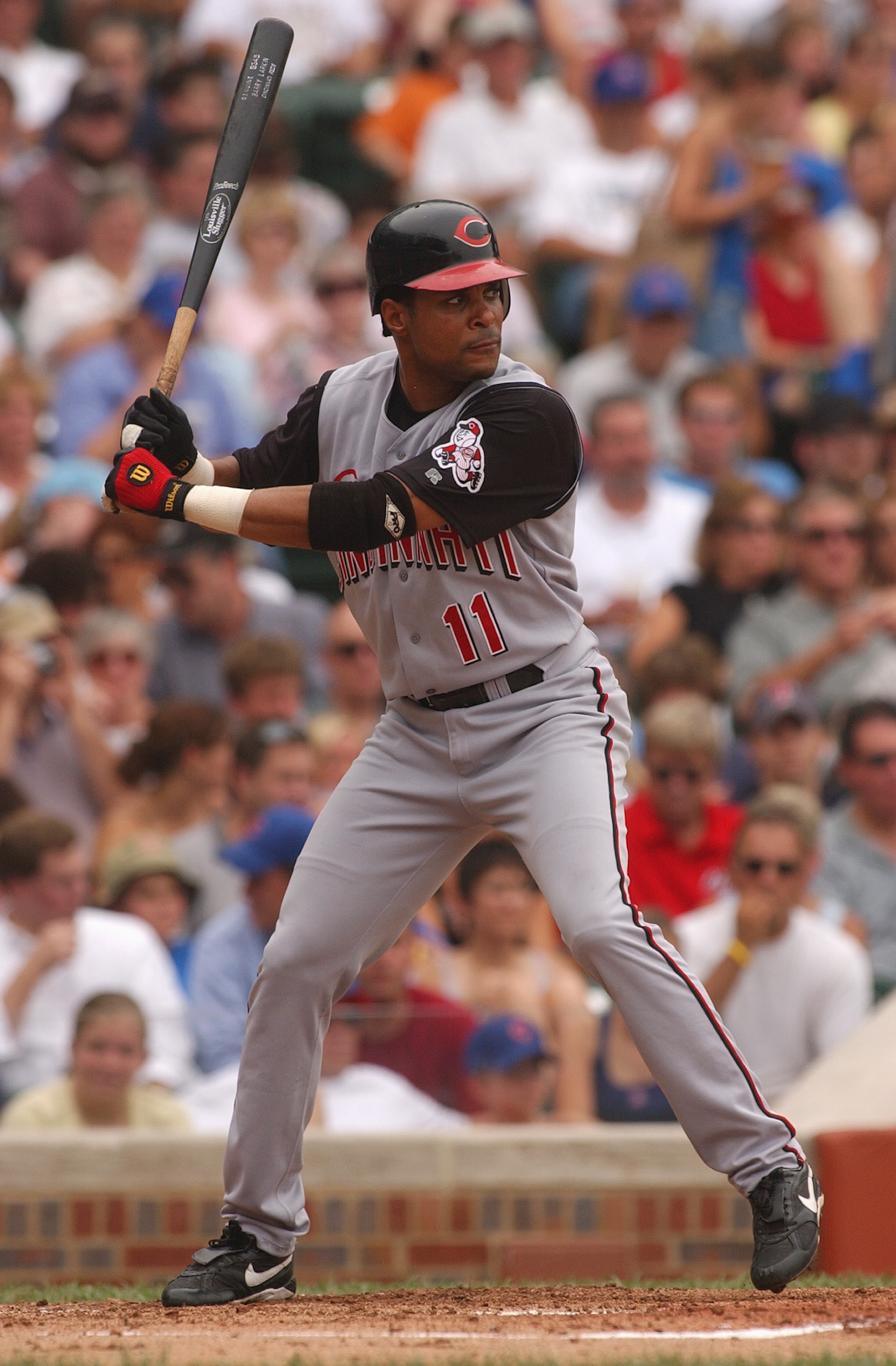 CHICAGO - JULY 21: Barry Larkin #11 of the Cincinnati Reds waits for a Chicago Cubs pitch during a game at Wrigley Field on July 21, 2004 in Chicago, Illinois. The Cubs defeated the Reds 5-4. (Photo by Jonathan Daniel/Getty Images) CHICAGO - JULY 21: Barry Larkin #11 of the Cincinnati Reds waits for a Chicago Cubs pitch during a game at Wrigley Field on July 21, 2004 in Chicago, Illinois. The Cubs defeated the Reds 5-4. (Photo by Jonathan Daniel/Getty Images)