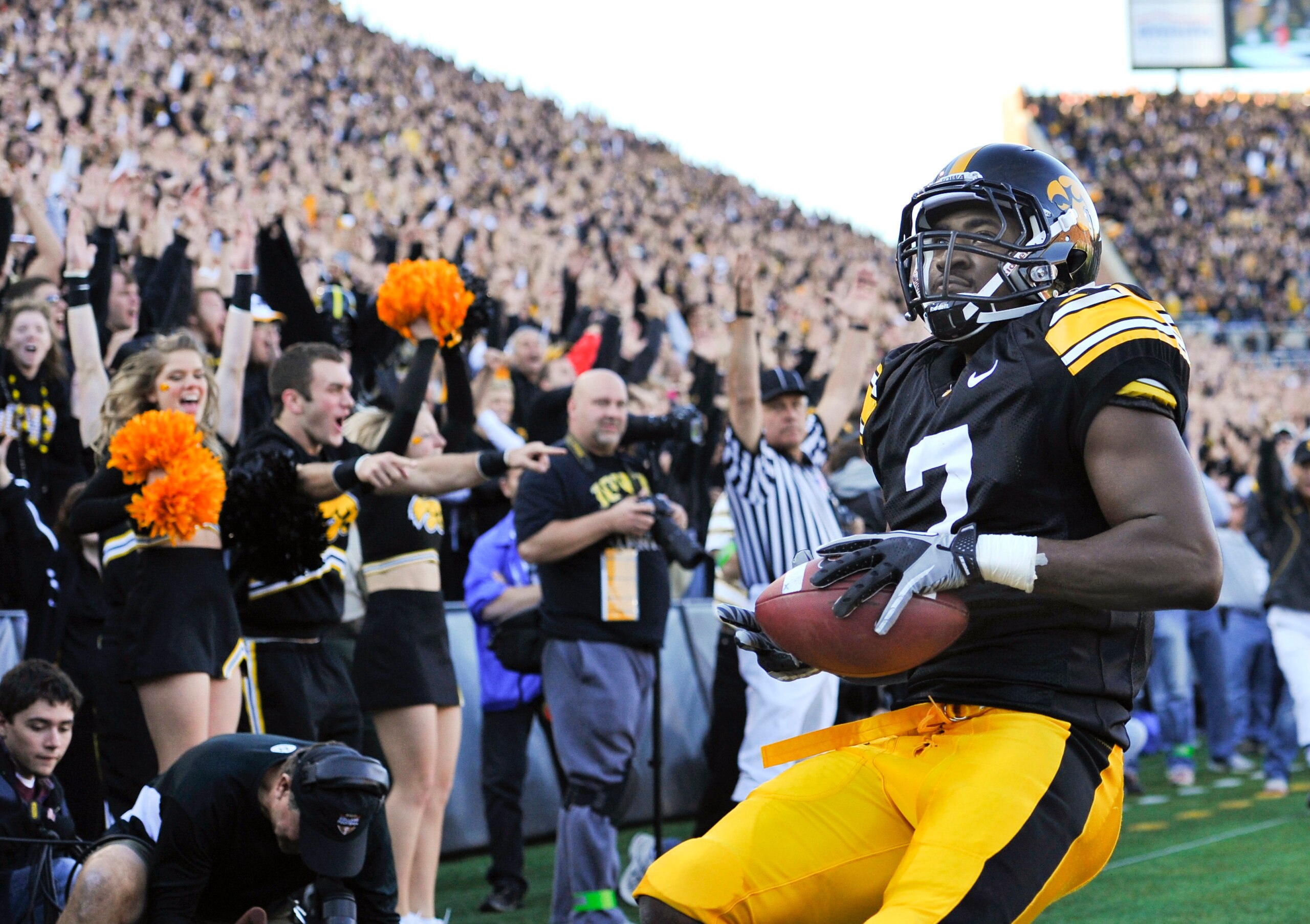 IOWA CITY, IA - OCTOBER 30: Wide receiver Marvin McNutt Jr. #7 of the University of Iowa Hawkeyes smiles as he scores a touch down against the Michigan State Spartans during the second half of play at Kinnick Stadium on October 30, 2010 in Iowa City, Iowa