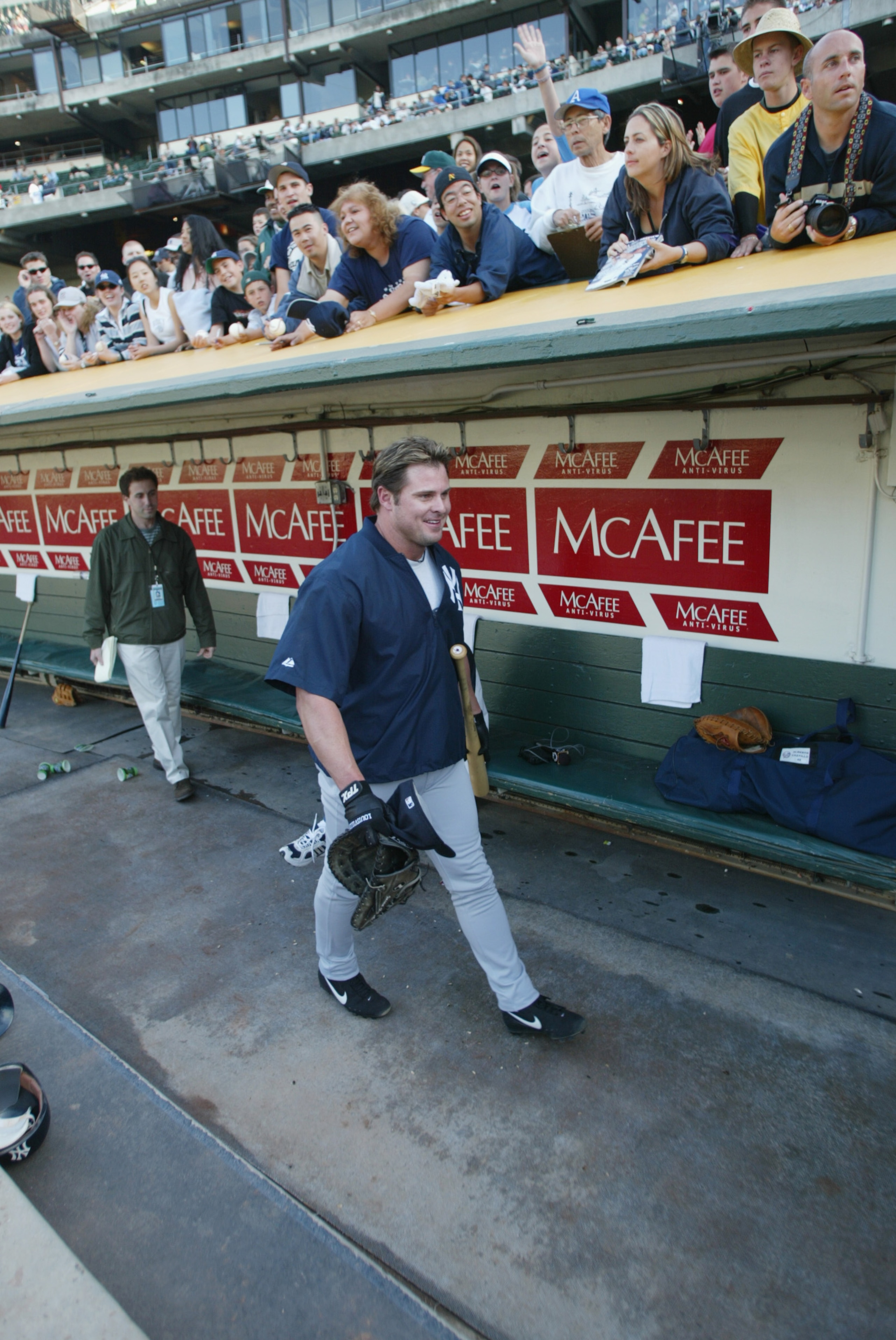 OAKLAND-APRIL 23 :   Jason Giambi#25 of the New York Yankees in the dugout prior to the game against the Oakland A's at Network Associates Coliseum in Oakland, California on April 23, 2002. The Yankees won 2-1. (Photo by Jed Jacobsohn/Getty Images)