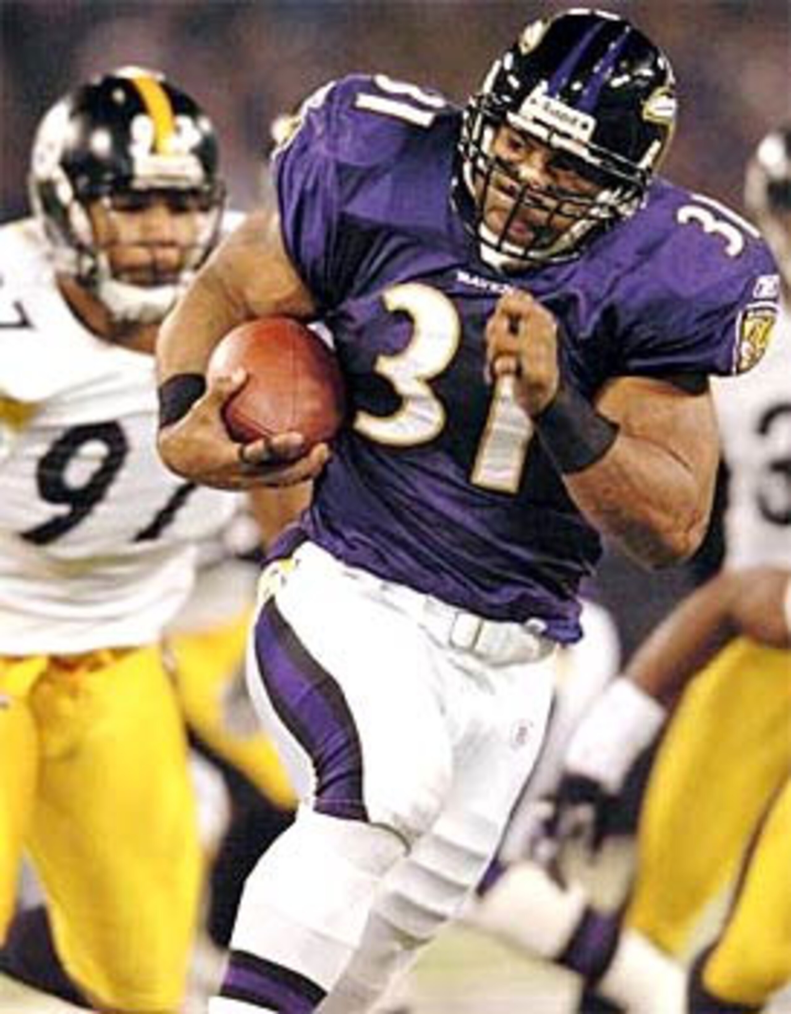 Jamal Lewis breaks loose for a 25 yard touchdown and topples 2000 yards