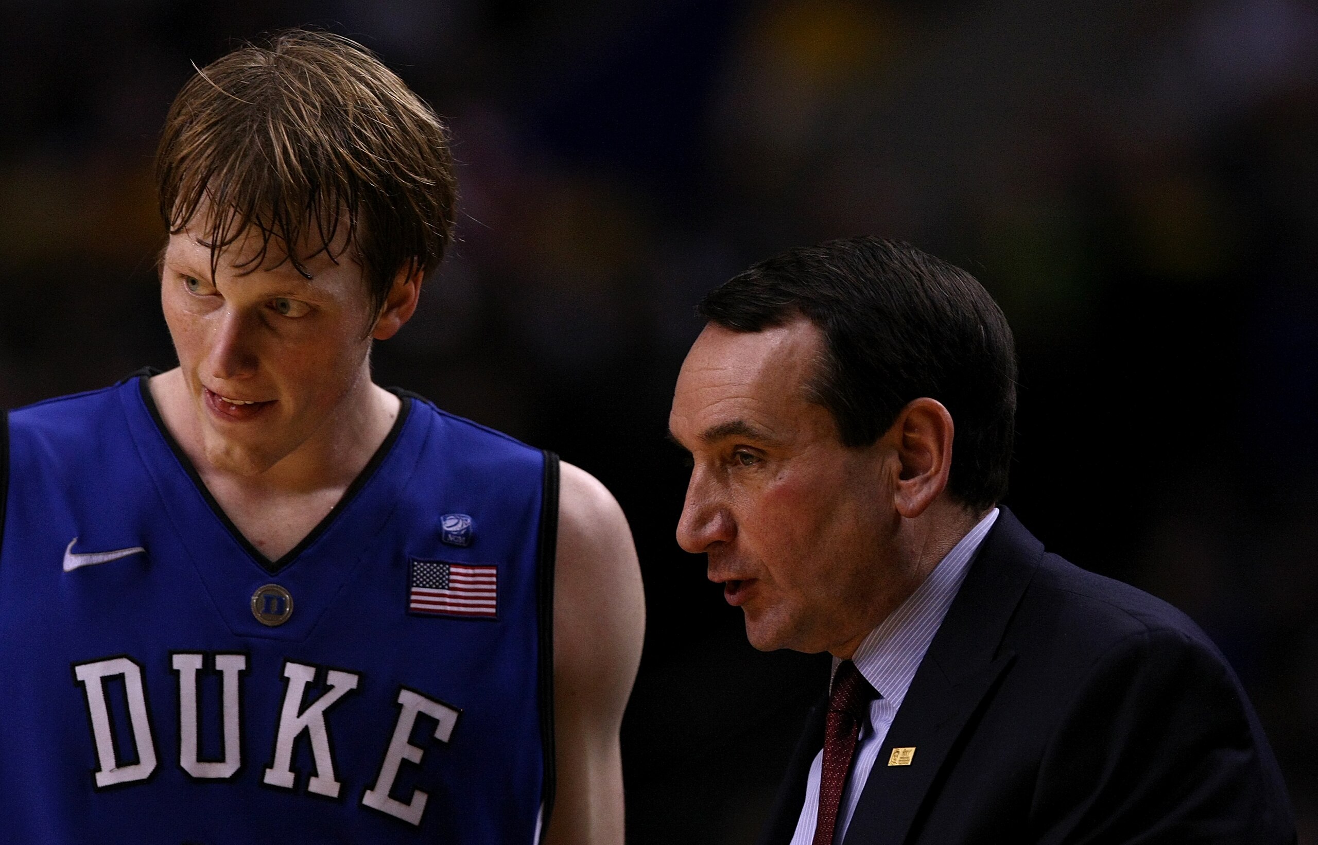 PORTLAND, OR - NOVEMBER 27:  Head Coach Mike Krzyzewski of the Duke Blue Devils talks Kyle Singler #12 against the Oregon Ducks on November 27, 2010 at the Rose Garden in Portland, Oregon.  (Photo by Jonathan Ferrey/Getty Images)