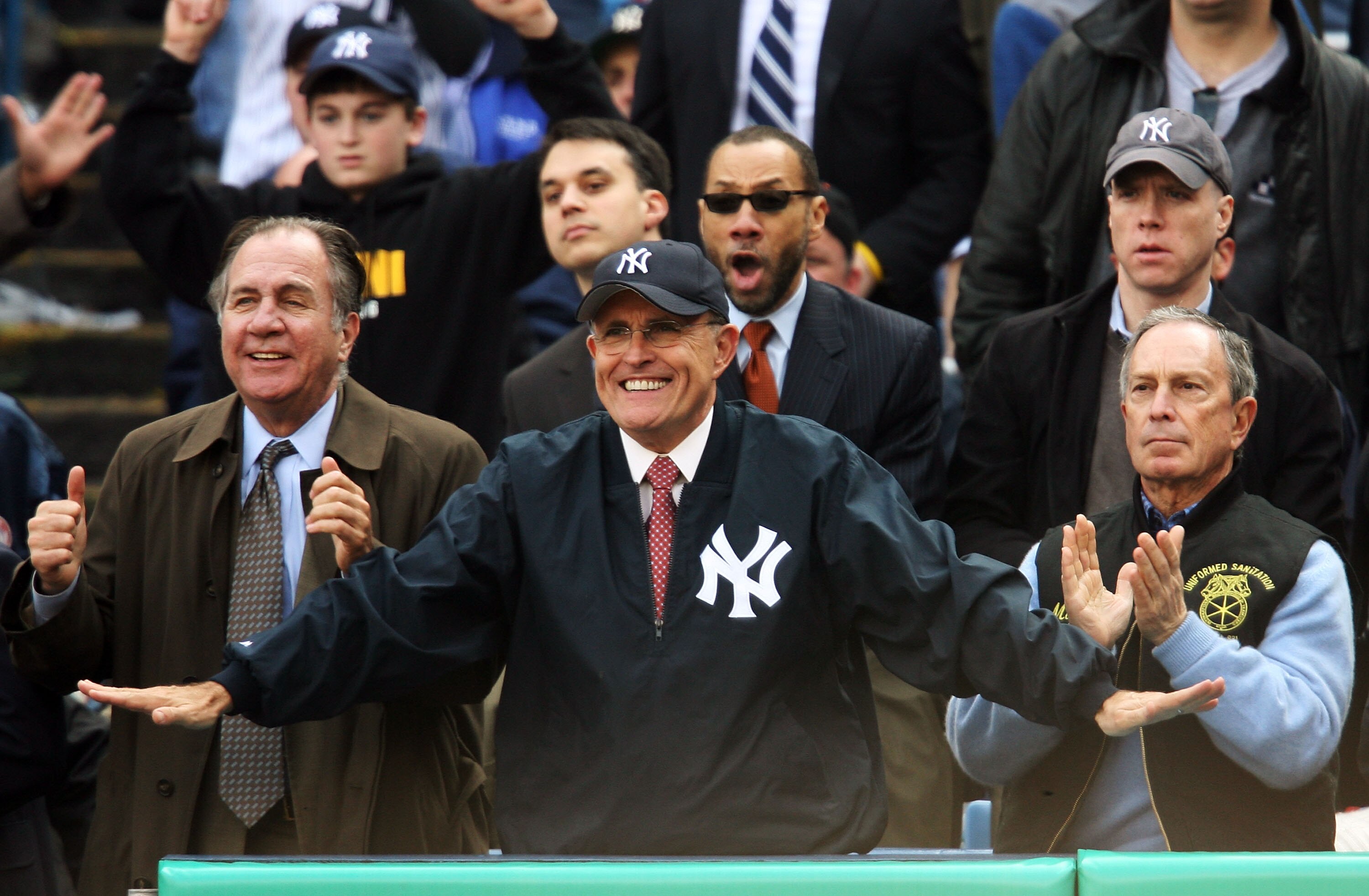 NEW YORK - APRIL 02:  Former New York City Major Rudolph Giuliani (C) and current mayor Michael Bloomberg (R) watch the New York Yankees play the Tampa Bay Devil Rays during their Opening Day game at Yankee Stadium April 2, 2007 in the Bronx borough of Ne