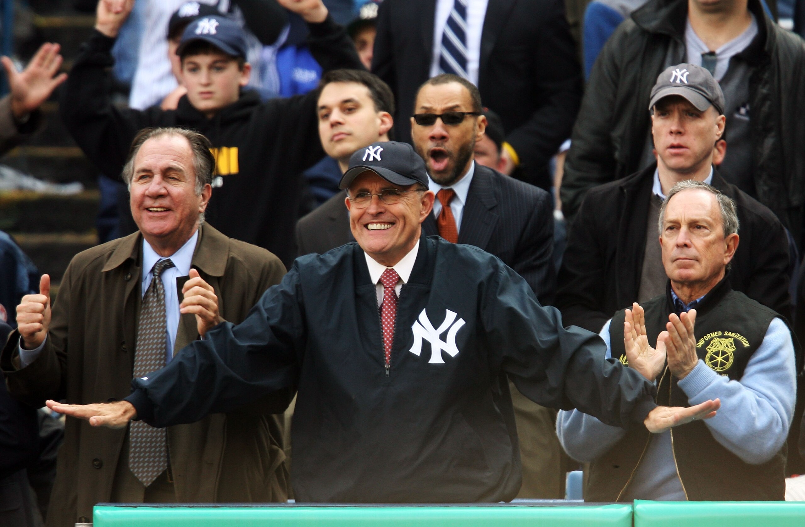 NEW YORK - APRIL 02:  Former New York City Major Rudolph Giuliani (C) and current mayor Michael Bloomberg (R) watch the New York Yankees play the Tampa Bay Devil Rays during their Opening Day game at Yankee Stadium April 2, 2007 in the Bronx borough of Ne