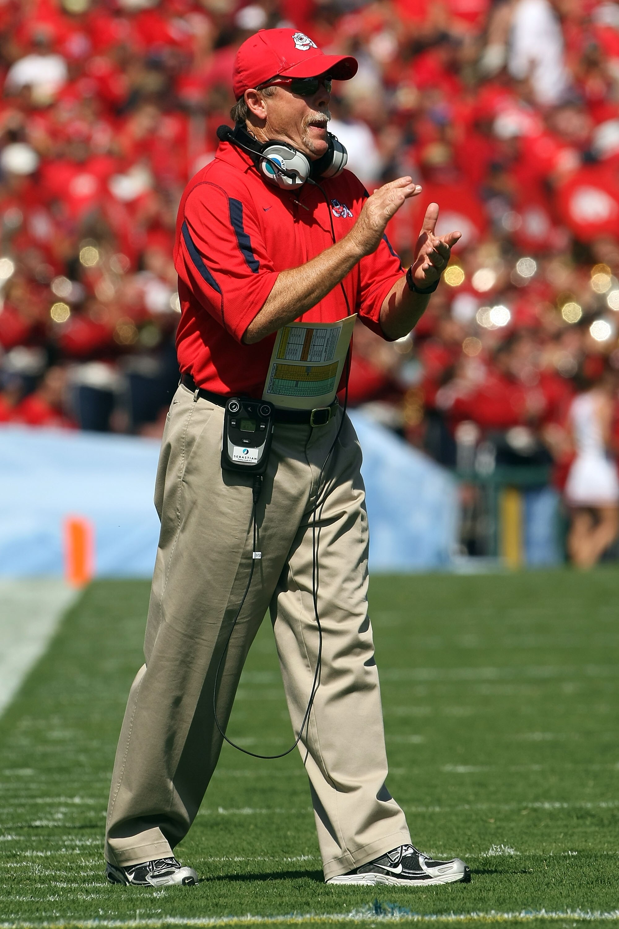PASADENA, CA - SEPTEMBER 27:  Head coach Pat Hill of the Frenso State Bulldogs claps on the sideline during the game against the UCLA Bruins on September 27, 2008 at the Rose Bowl in Pasadena, California.  (Photo by Stephen Dunn/Getty Images)