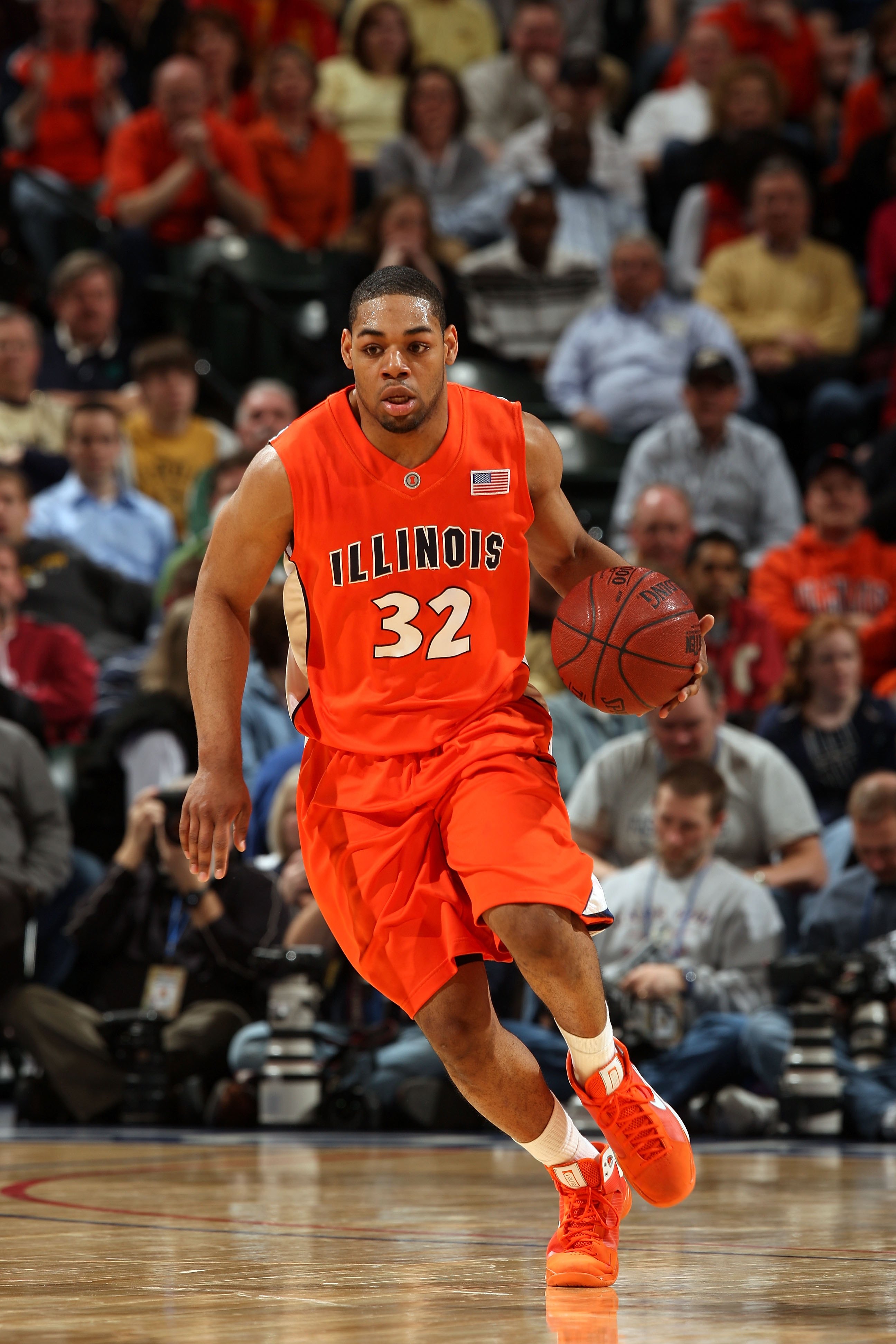 INDIANAPOLIS - MARCH 14: Demetri McCamey #32 of the Illinois Fighting Illini brings the ball up court against the Purdue Boilermakers during their semifinal game of the Big Ten Men's Basketball Tournament at Conseco Fieldhouse on March 14, 2009 in Indian INDIANAPOLIS - MARCH 14: Demetri McCamey #32 of the Illinois Fighting Illini brings the ball up court against the Purdue Boilermakers during their semifinal game of the Big Ten Men's Basketball Tournament at Conseco Fieldhouse on March 14, 2009 in Indian