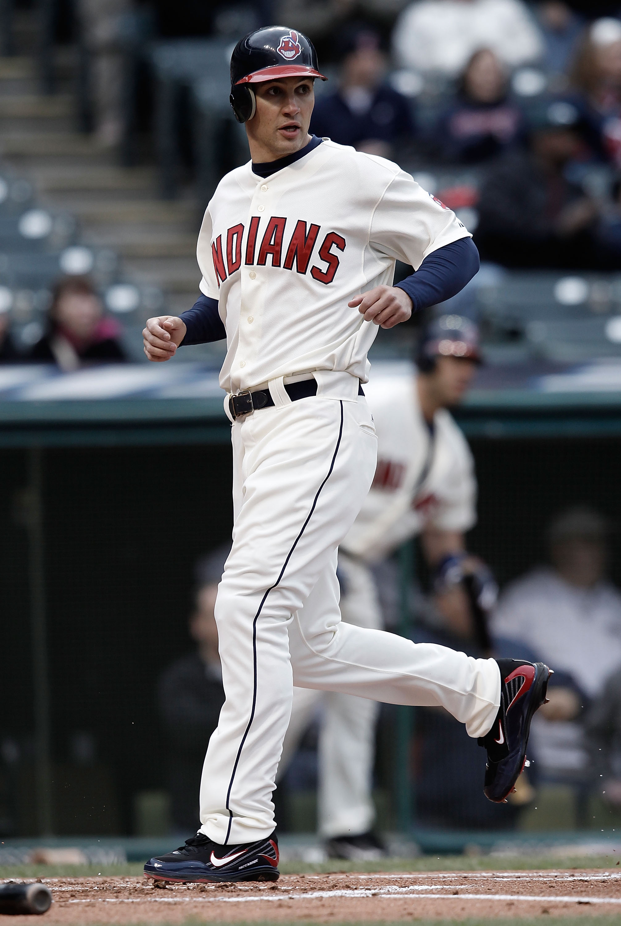 CLEVELAND - APRIL 17:  Grady Sizemore #24 of the Cleveland Indians crosses home plate after scoring in the first inning against the Chicago White Sox during the game on April 17, 2010 at Progressive Field in Cleveland, Ohio.  (Photo by Jared Wickerham/Get