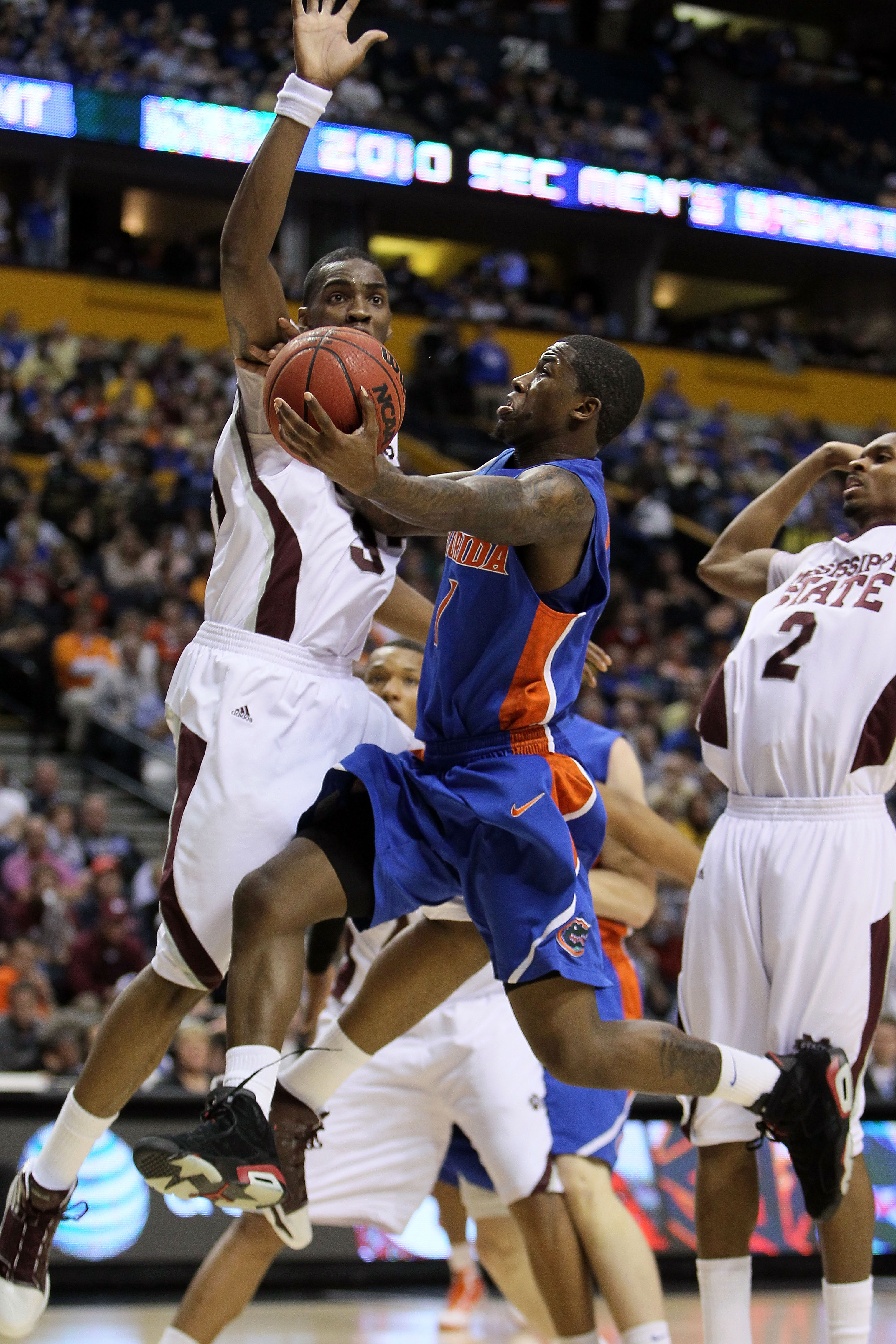 NASHVILLE, TN - MARCH 12: Kenny Boynton #1 of the Florida Gators drives for a shot attempt against the Mississippi State Bulldogs during the quarterfinals of the SEC Men's Basketball Tournament at the Bridgestone Arena on March 12, 2010 in Nashville, Ten NASHVILLE, TN - MARCH 12: Kenny Boynton #1 of the Florida Gators drives for a shot attempt against the Mississippi State Bulldogs during the quarterfinals of the SEC Men's Basketball Tournament at the Bridgestone Arena on March 12, 2010 in Nashville, Ten