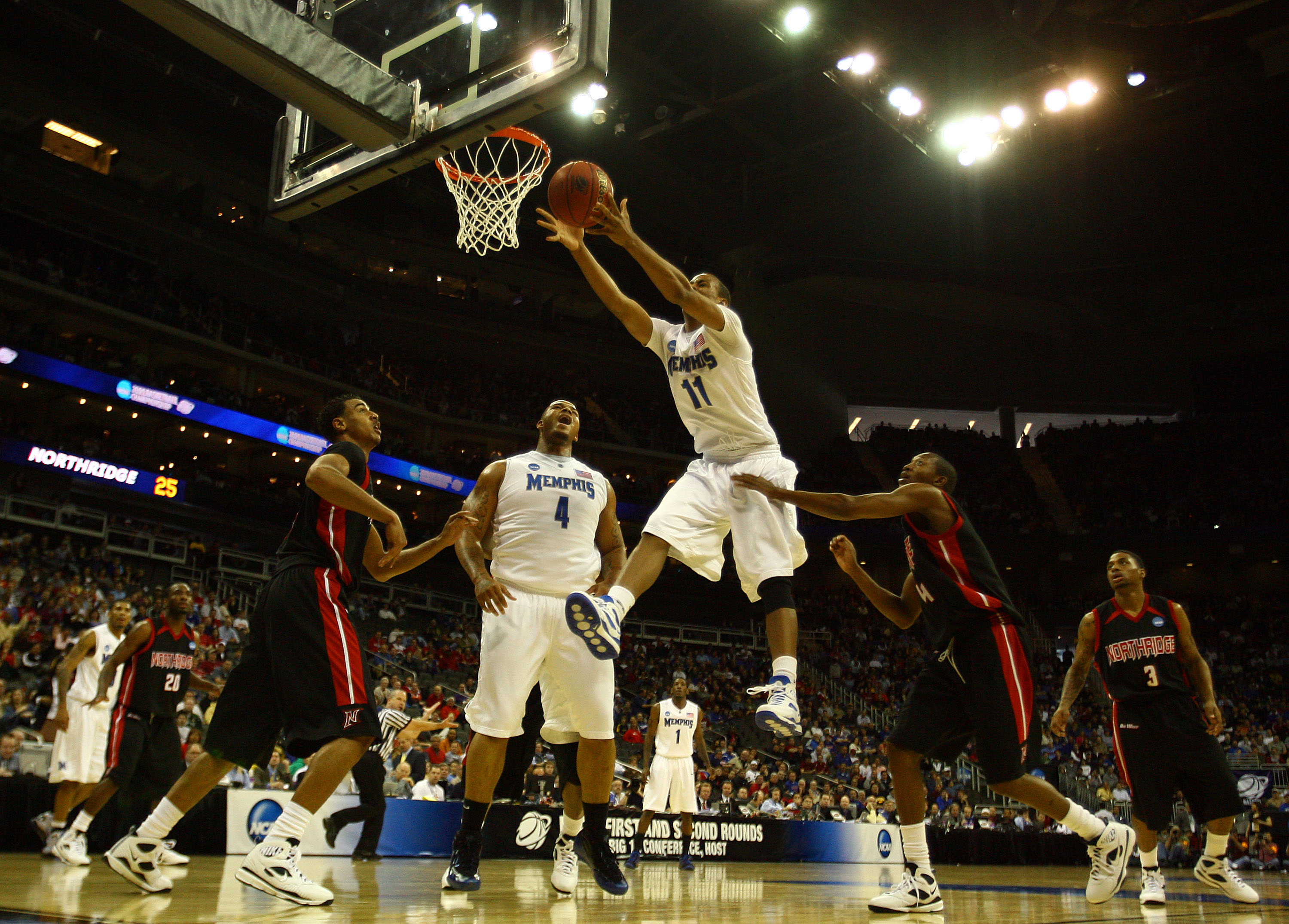 KANSAS CITY, MO - MARCH 19: Wesley Witherspoon #11 of the Memphis Tigers goes up for the loose ball in the first half against the CSUN Matadors during the first round of the NCAA Division I Men's Basketball Tournament at the Sprint Center on March 19, 20 KANSAS CITY, MO - MARCH 19: Wesley Witherspoon #11 of the Memphis Tigers goes up for the loose ball in the first half against the CSUN Matadors during the first round of the NCAA Division I Men's Basketball Tournament at the Sprint Center on March 19, 20