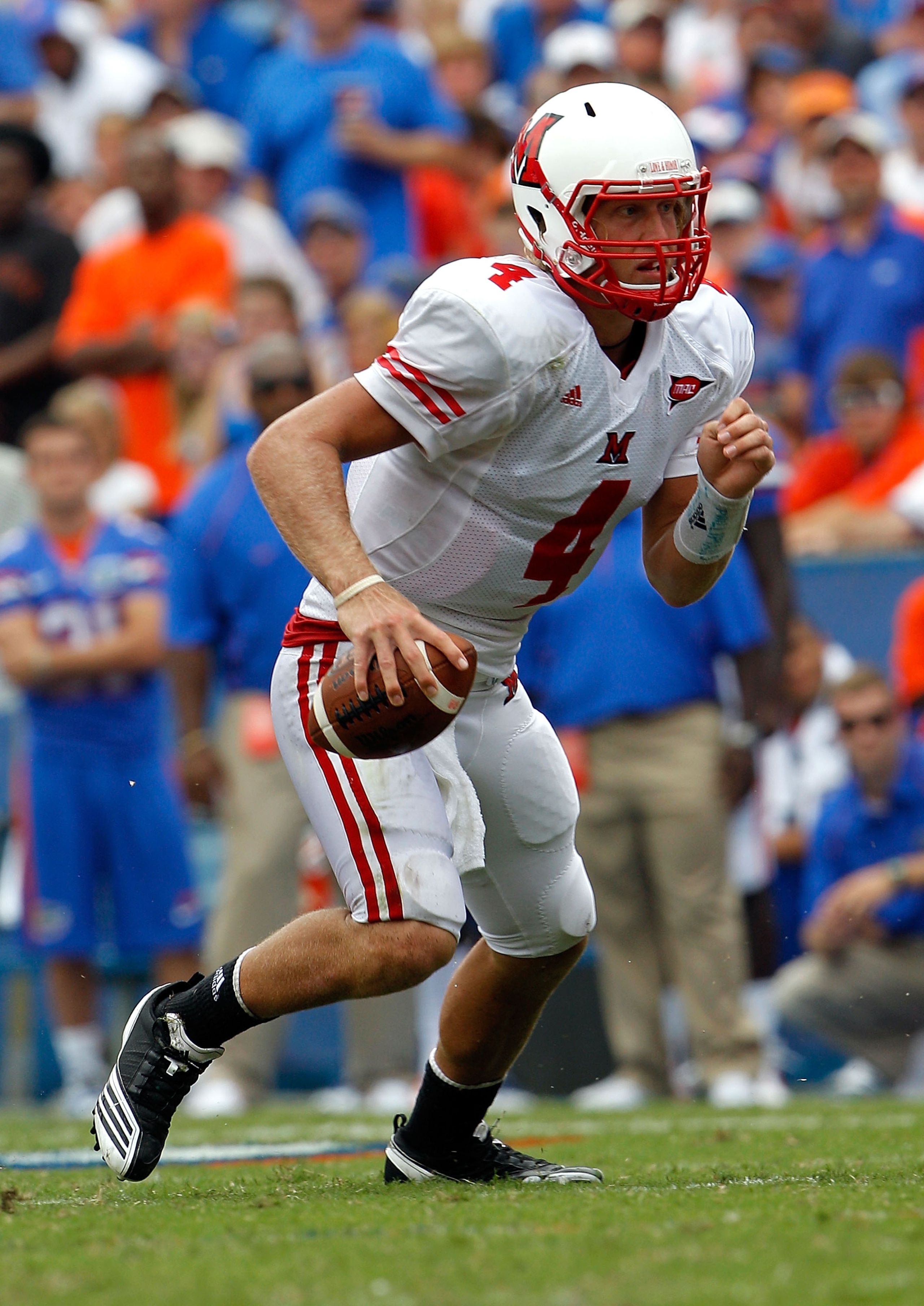 GAINESVILLE, FL - SEPTEMBER 04:  Quarterback Zac Dysert #4 of the Miami University RedHawks runs against the Florida Gators at Ben Hill Griffin Stadium on September 4, 2010 in Gainesville, Florida.  (Photo by Sam Greenwood/Getty Images)