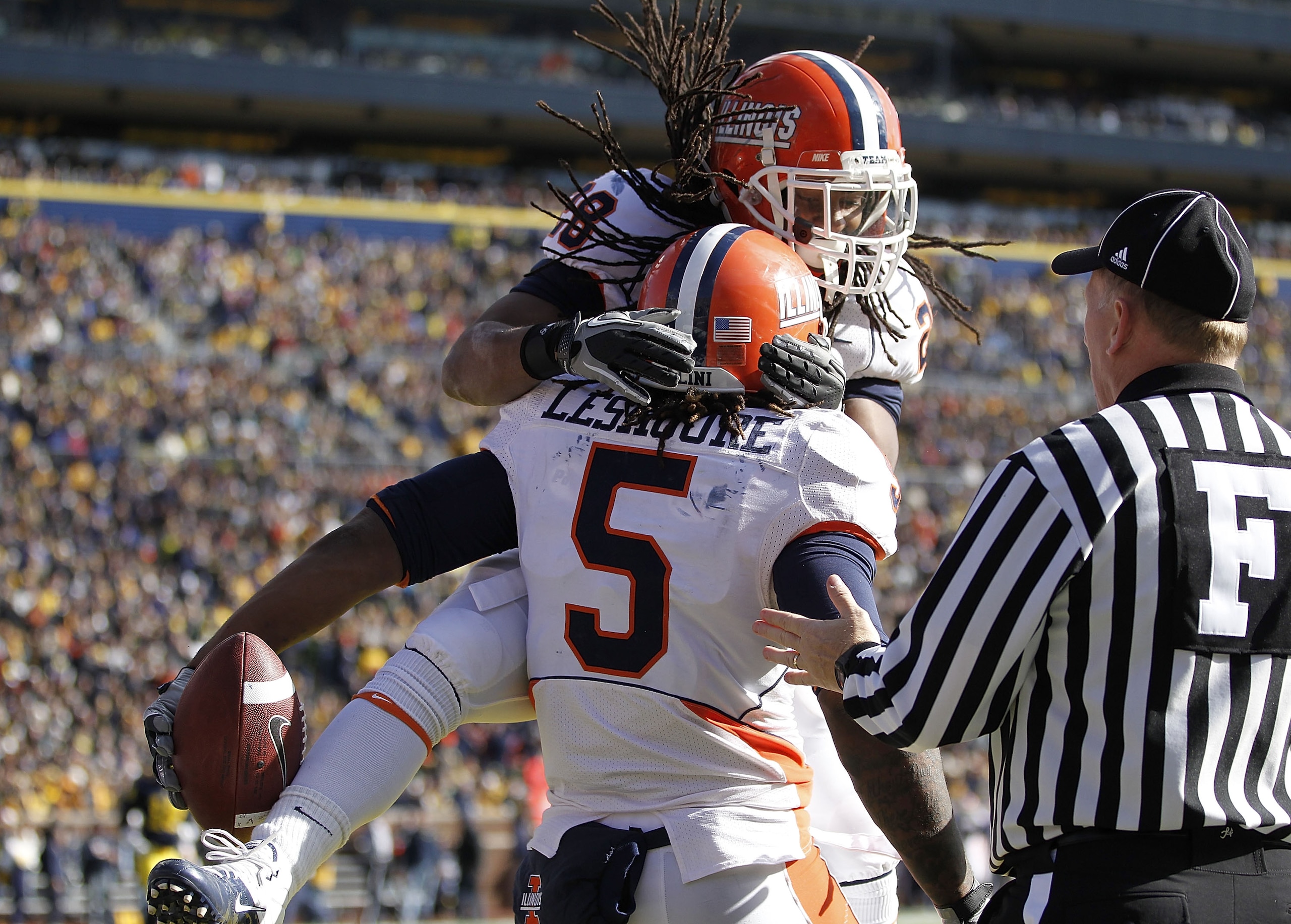 ANN ARBOR, MI - NOVEMBER 06: Mikel Leshoure #5 of the Illinios Fighting Illini celebrates a fourth quarter touchdown reception with Troy Pollard #28 while playing the Michigan Wolverines at Michigan Stadium on November 6, 2010 in Ann Arbor, Michigan. Mic ANN ARBOR, MI - NOVEMBER 06: Mikel Leshoure #5 of the Illinios Fighting Illini celebrates a fourth quarter touchdown reception with Troy Pollard #28 while playing the Michigan Wolverines at Michigan Stadium on November 6, 2010 in Ann Arbor, Michigan. Mic