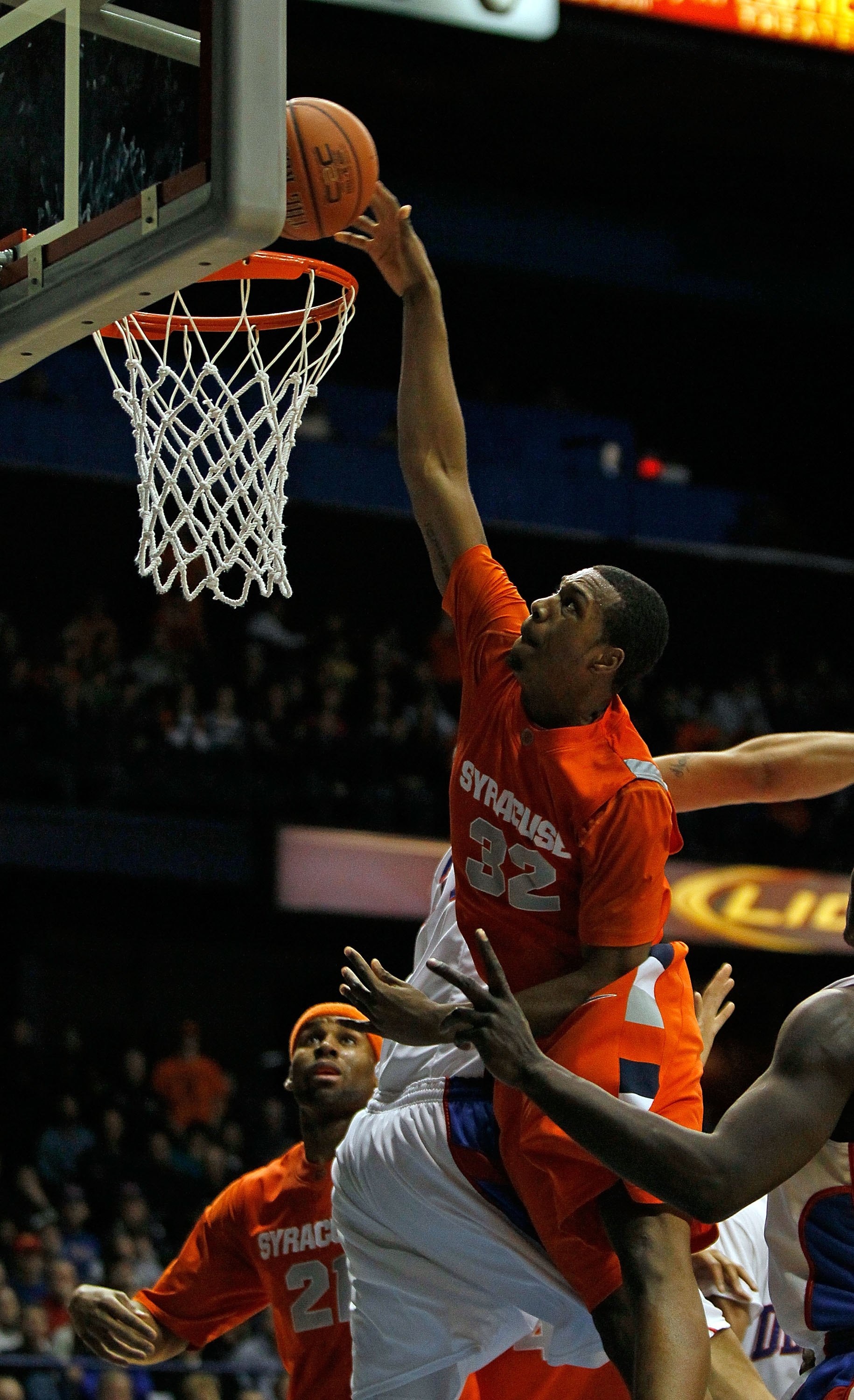 ROSEMONT, IL - JANUARY 30: Kris Joseph #32 of the Syracuse Orange puts up a shot over Kris Faber #33 of the DePaul Blue Demons at the Allstate Arena on January 30, 2010 in Rosemont, Illinois. Syracuse defeated DePaul 59-57. (Photo by Jonathan Daniel/Getty ROSEMONT, IL - JANUARY 30: Kris Joseph #32 of the Syracuse Orange puts up a shot over Kris Faber #33 of the DePaul Blue Demons at the Allstate Arena on January 30, 2010 in Rosemont, Illinois. Syracuse defeated DePaul 59-57. (Photo by Jonathan Daniel/Getty