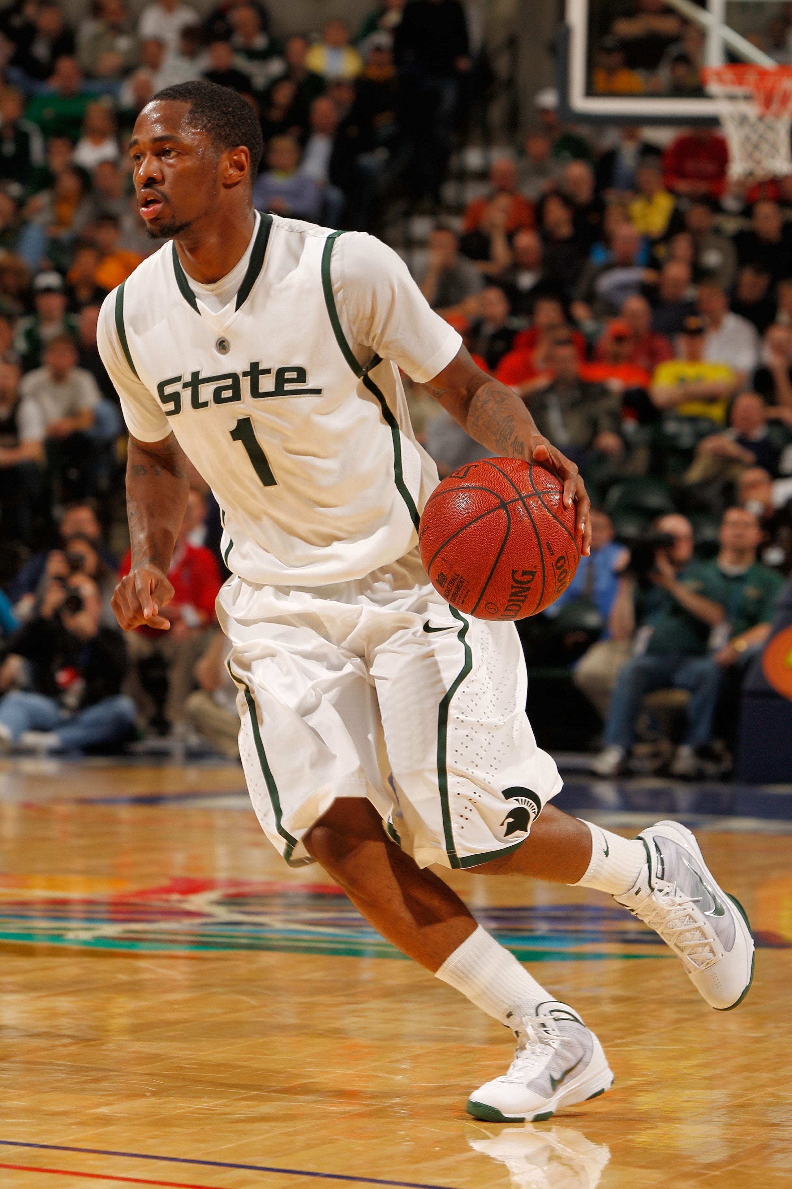 INDIANAPOLIS - MARCH 12:  Kalin Lucas #1 of the Michigan State Spartans moves the ball against the Minnesota Golden Gophers during the quarterfinals of the Big Ten Men's Basketball Tournament at Conseco Fieldhouse on March 12, 2010 in Indianapolis, Indian