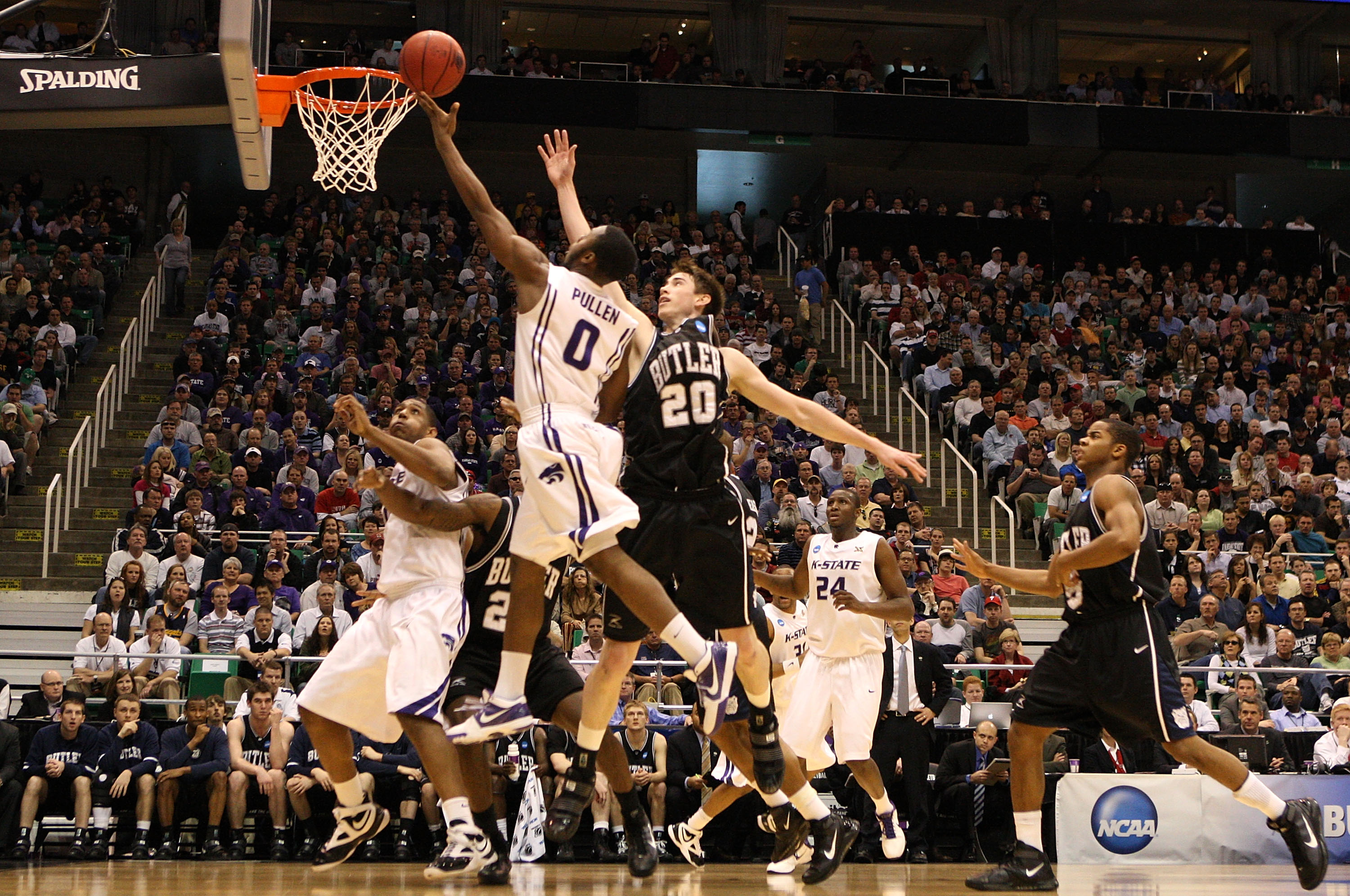 SALT LAKE CITY - MARCH 27: Gordon Hayward #20 of the Butler Bulldogs defends against Jacob Pullen #0 of the Kansas State Wildcats during the west regional final of the 2010 NCAA men's basketball tournament at the Energy Solutions Arena on March 27, 2010 SALT LAKE CITY - MARCH 27: Gordon Hayward #20 of the Butler Bulldogs defends against Jacob Pullen #0 of the Kansas State Wildcats during the west regional final of the 2010 NCAA men's basketball tournament at the Energy Solutions Arena on March 27, 2010