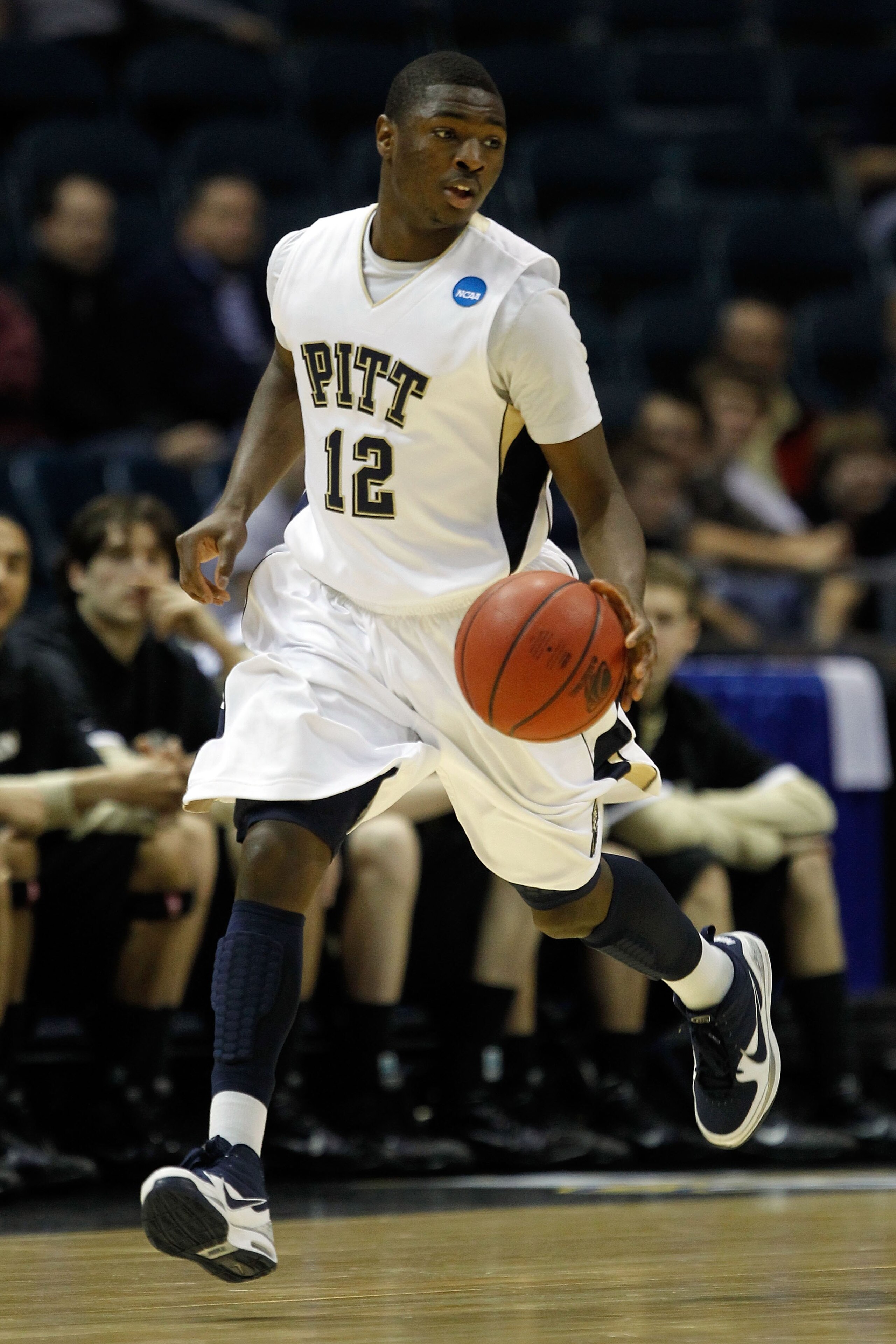 MILWAUKEE - MARCH 19:  Ashton Gibbs #12 of the Pittsburgh Panthers moves the ball while taking on the Oakland Golden Grizzlies during the first round of the 2010 NCAA men's basketball tournament at the Bradley Center on March 19, 2010 in Milwaukee, Wiscon